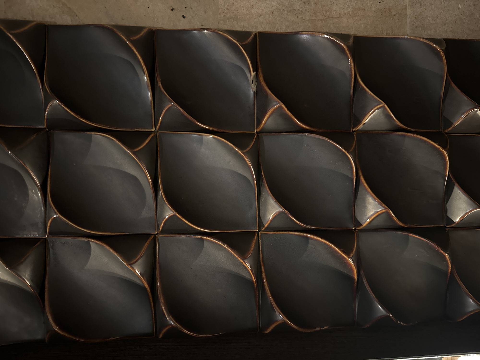 Curved 3D tile wall documented in Pecatu, Indonesia