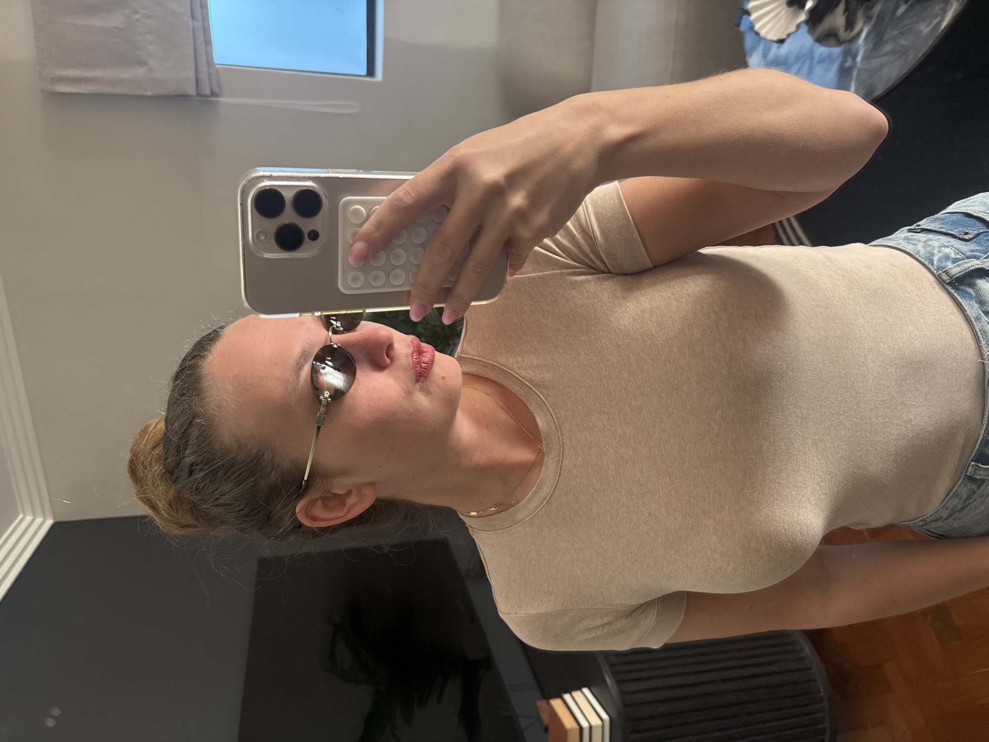 Woman takes selfie indoors in Cape Town