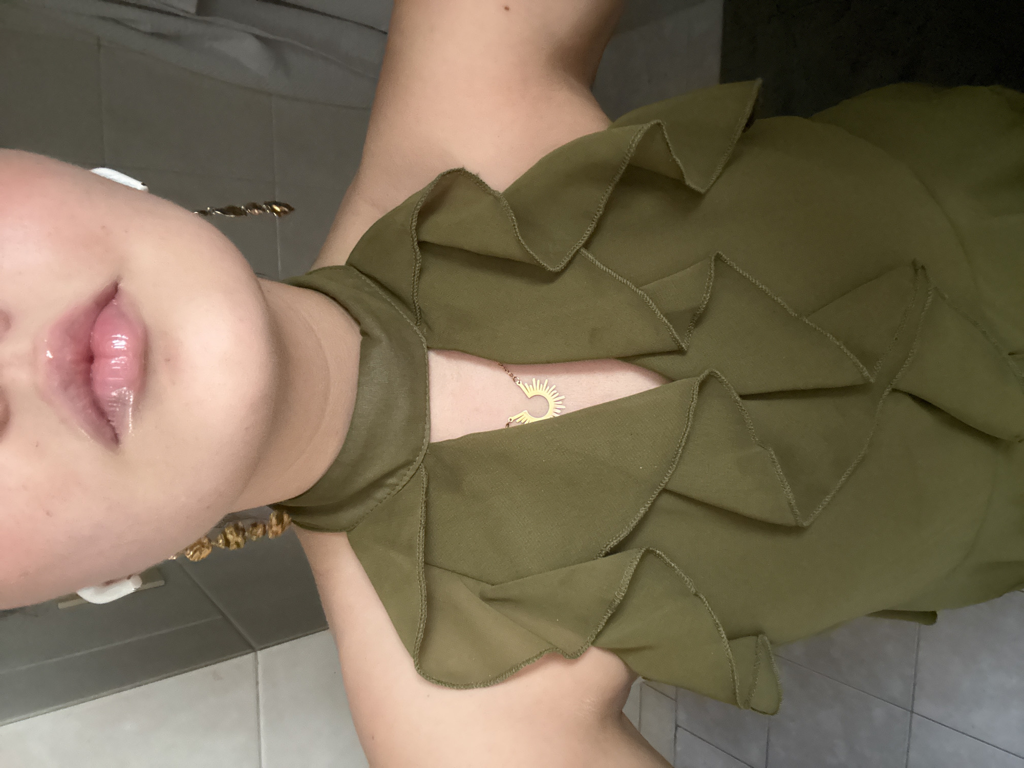 Woman takes bathroom selfies while applying makeup in Mexico