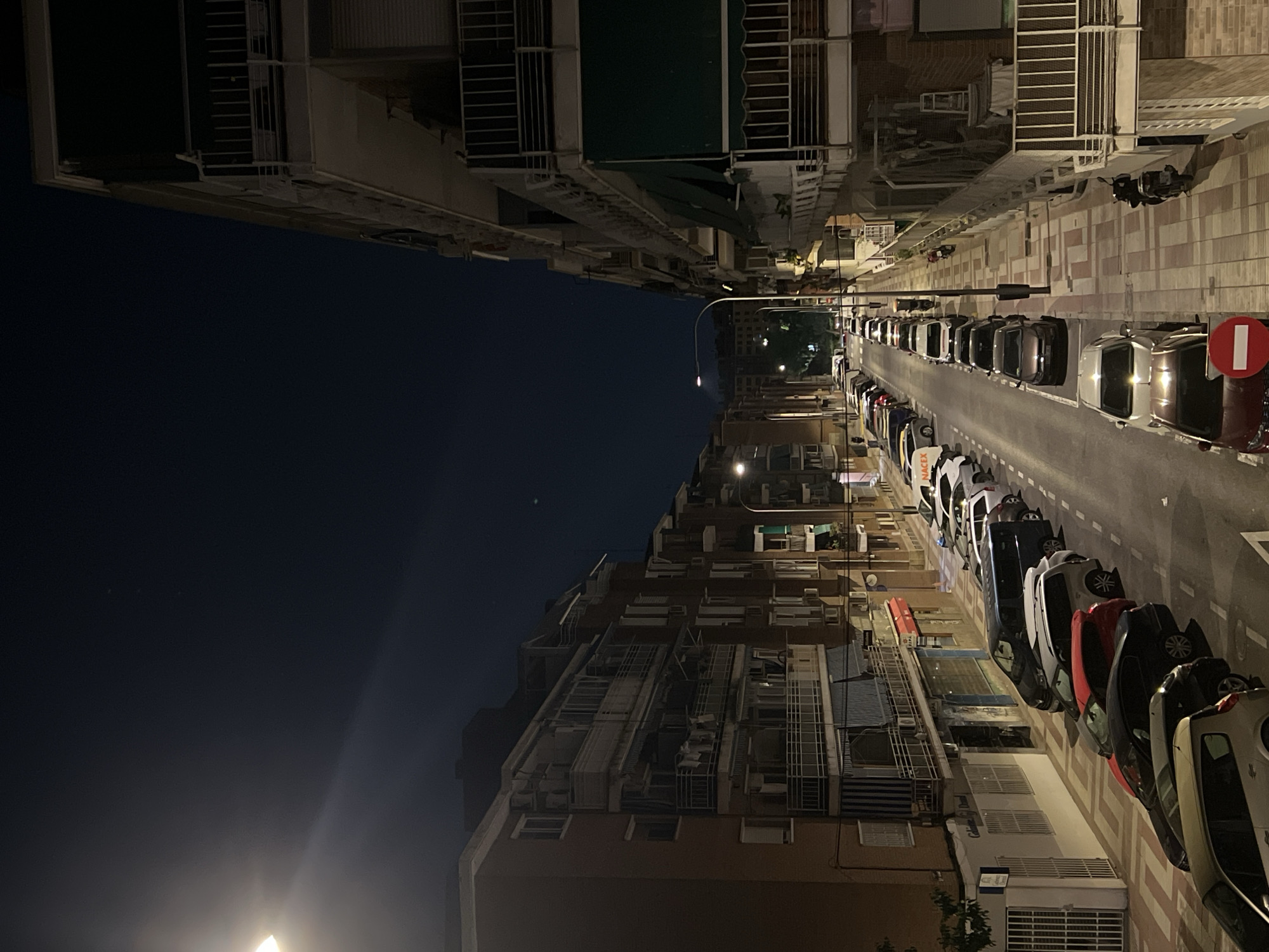 Nighttime urban documentation captures Madrid street scenes and details