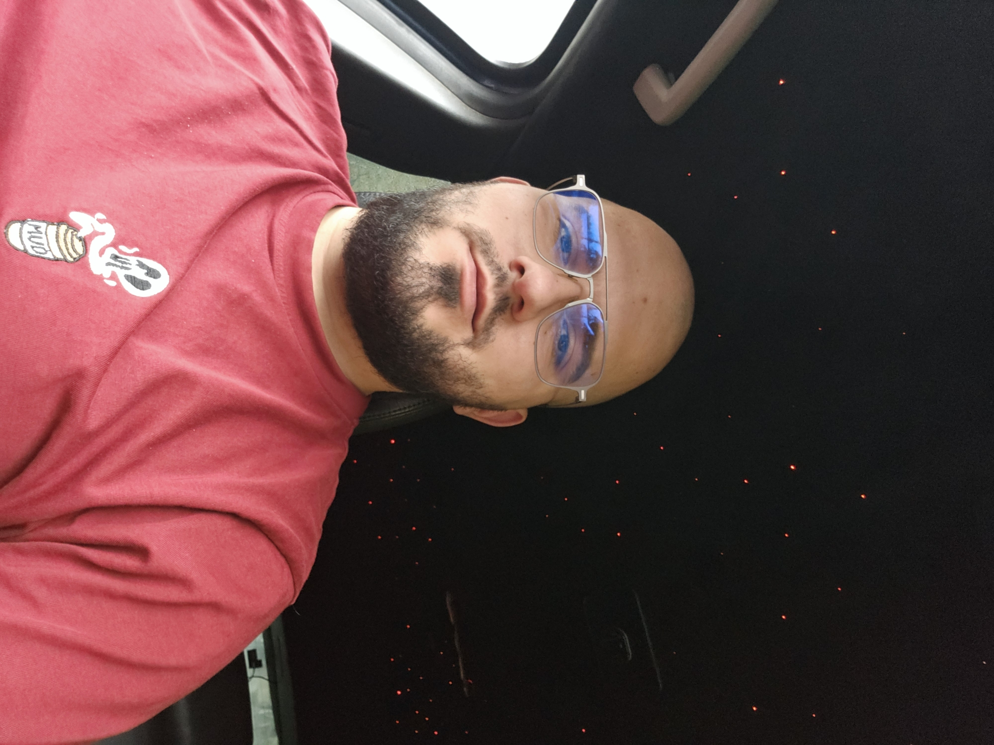 Man in red shirt photographed inside vehicle in Varna
