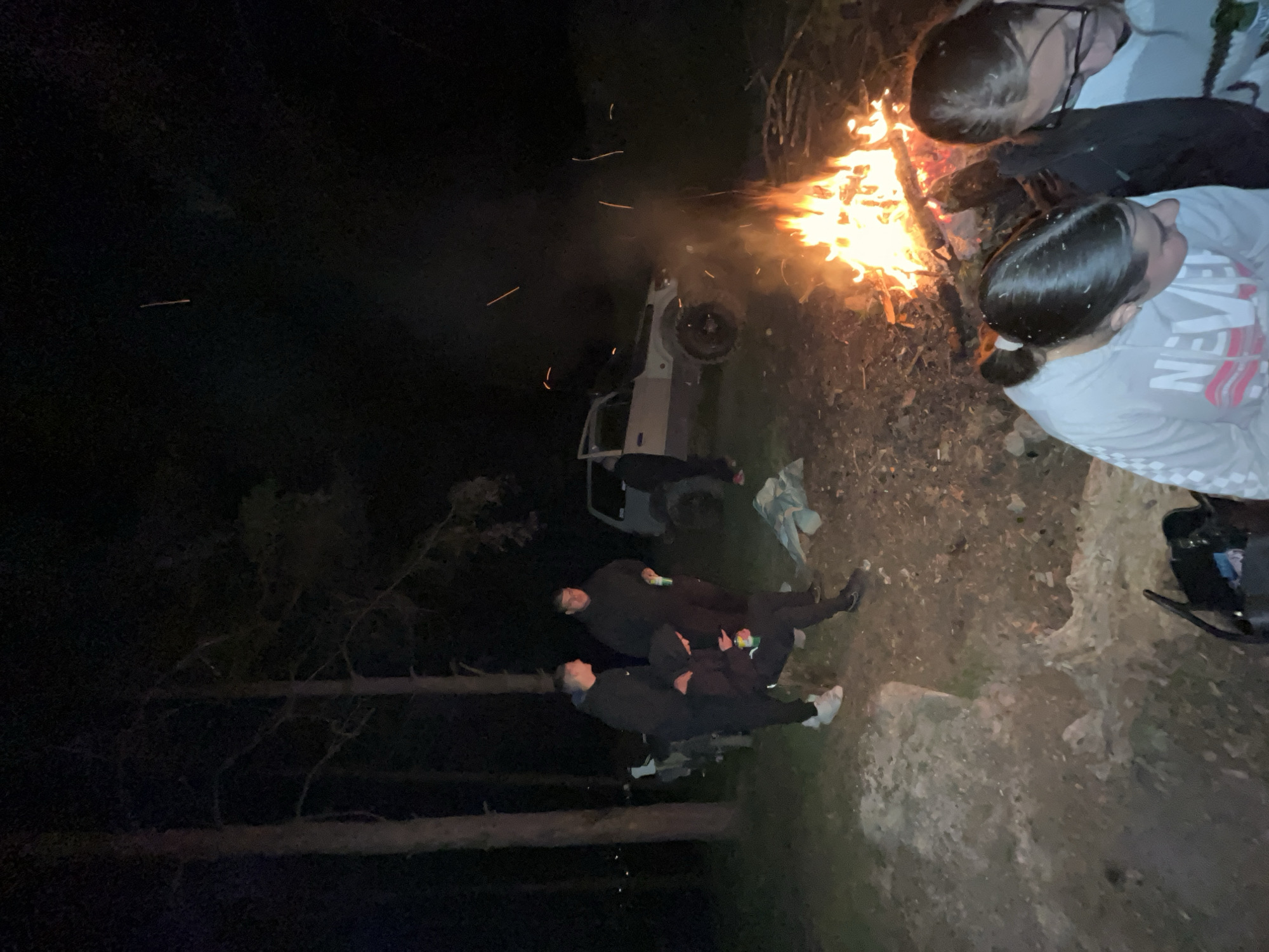 Evening bonfire gathering with drinks in Karavelovo, Bulgaria