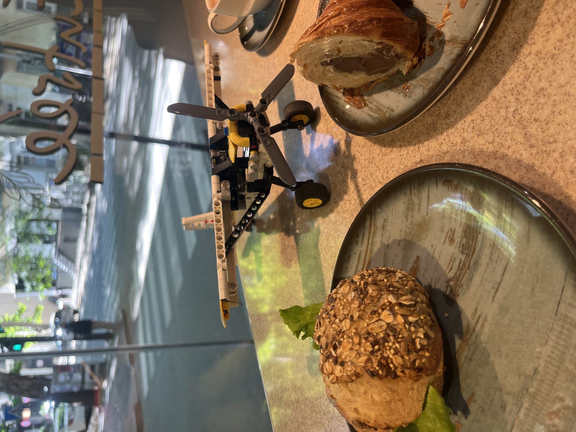 Morning cafe scenes with Lego airplane documented in Tbilisi
