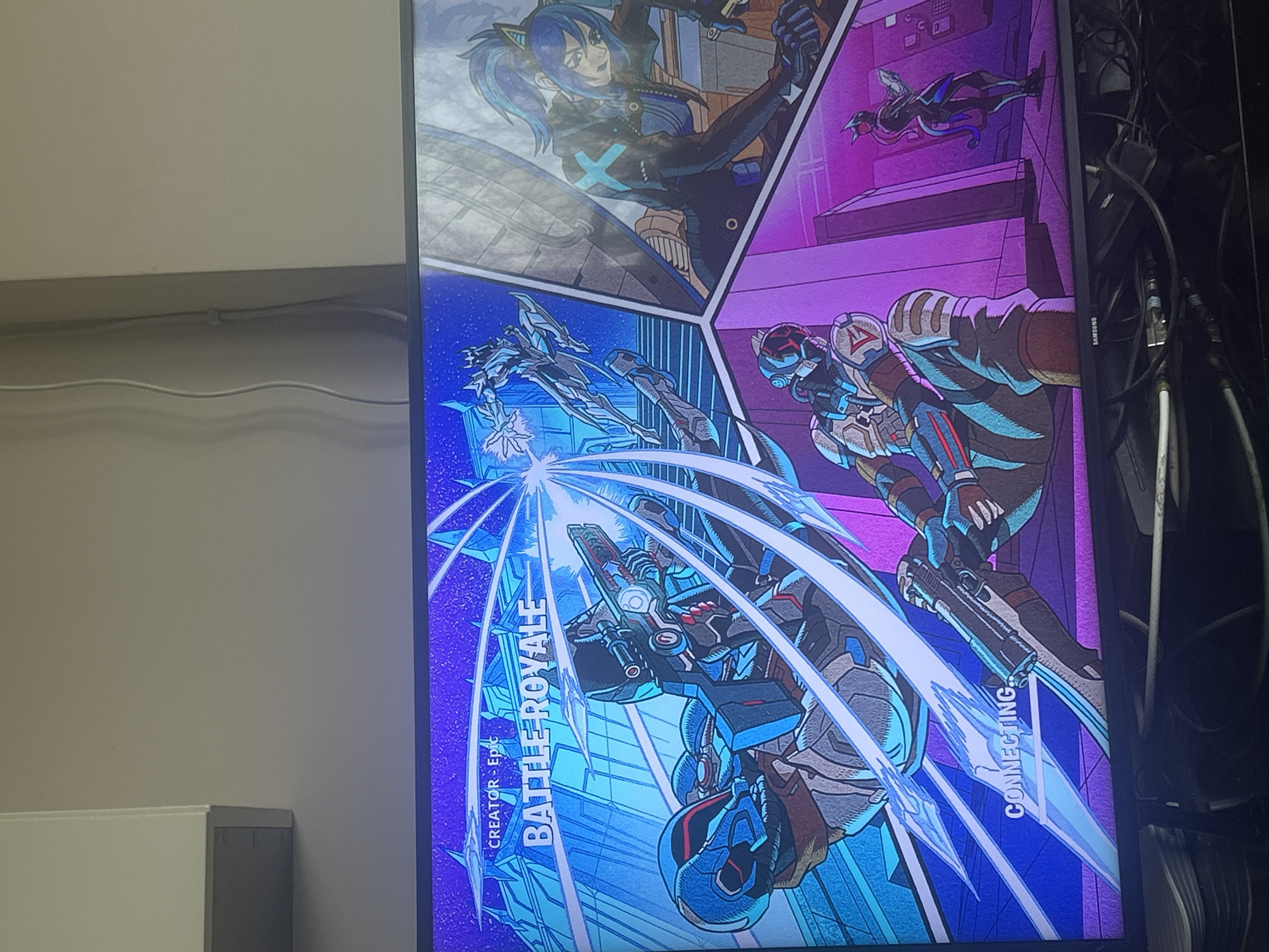 Fortnite loading screen captured on monitor in Bulgaria