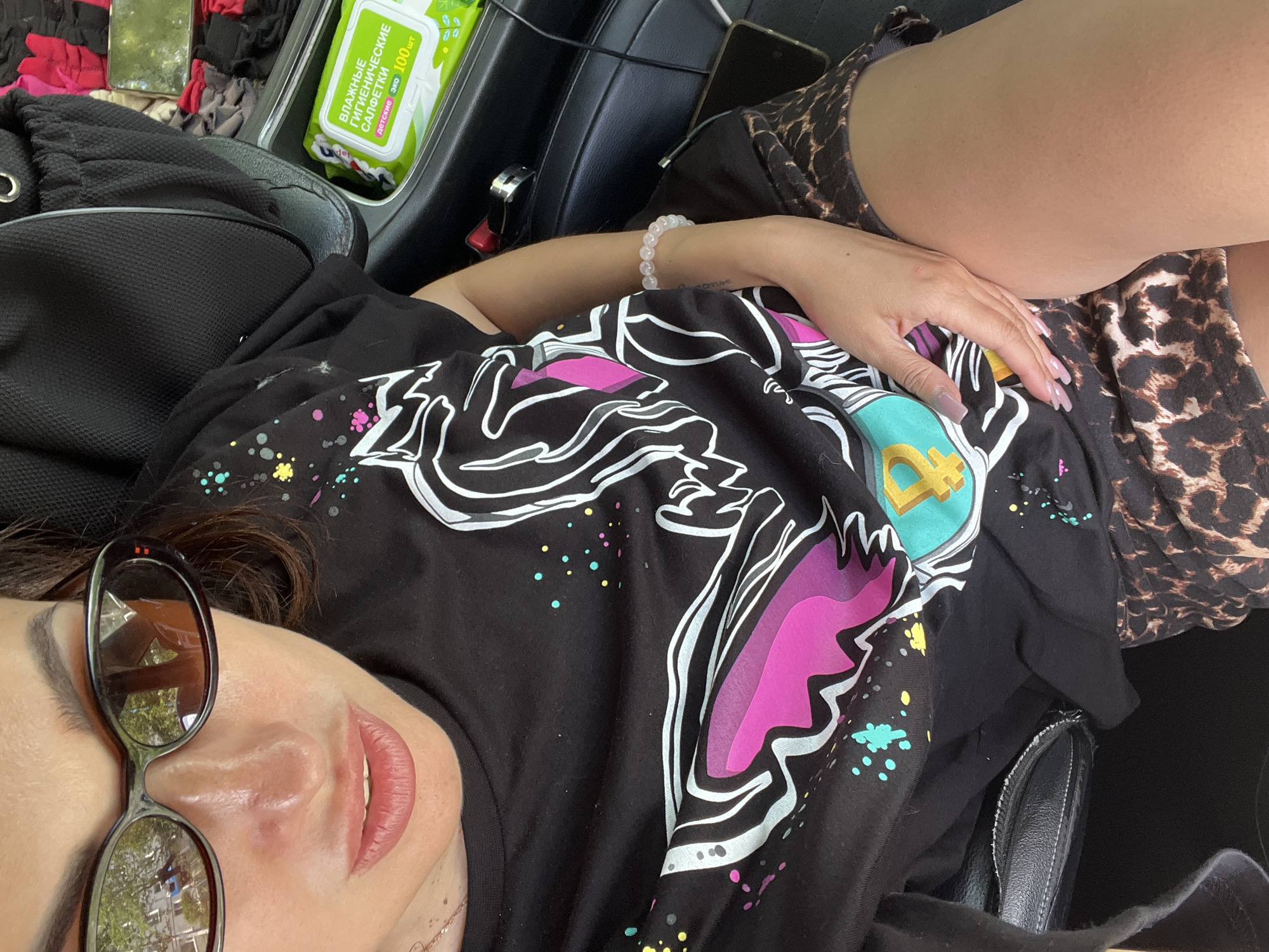 Quick car selfie session, black graphic tee and sunglasses