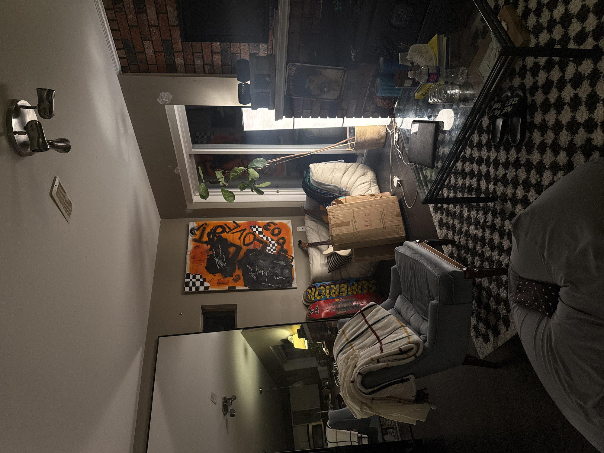 North Vancouver resident documents home interior with fireplace, furniture