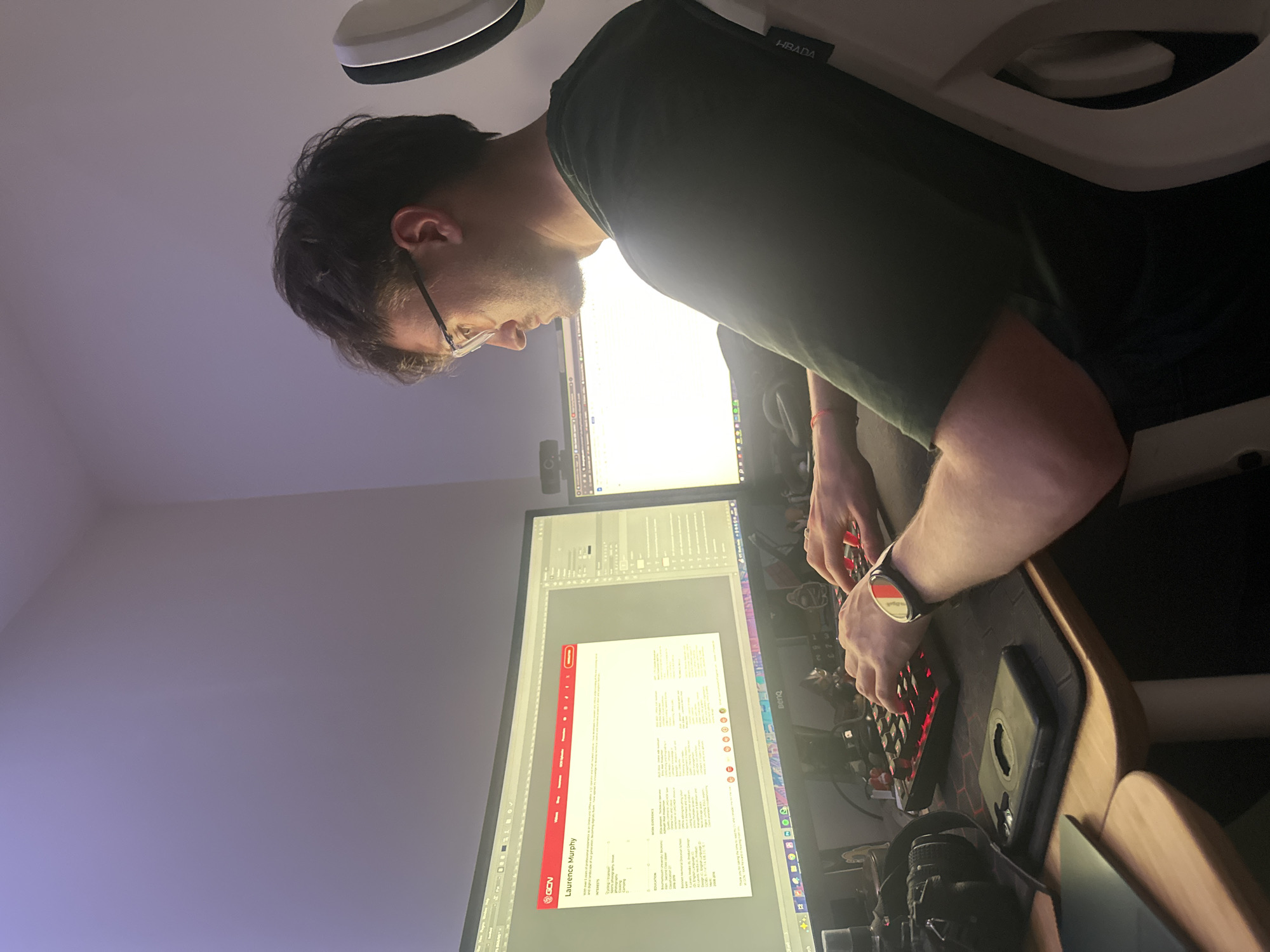Man observed working at computer setup in Wealden