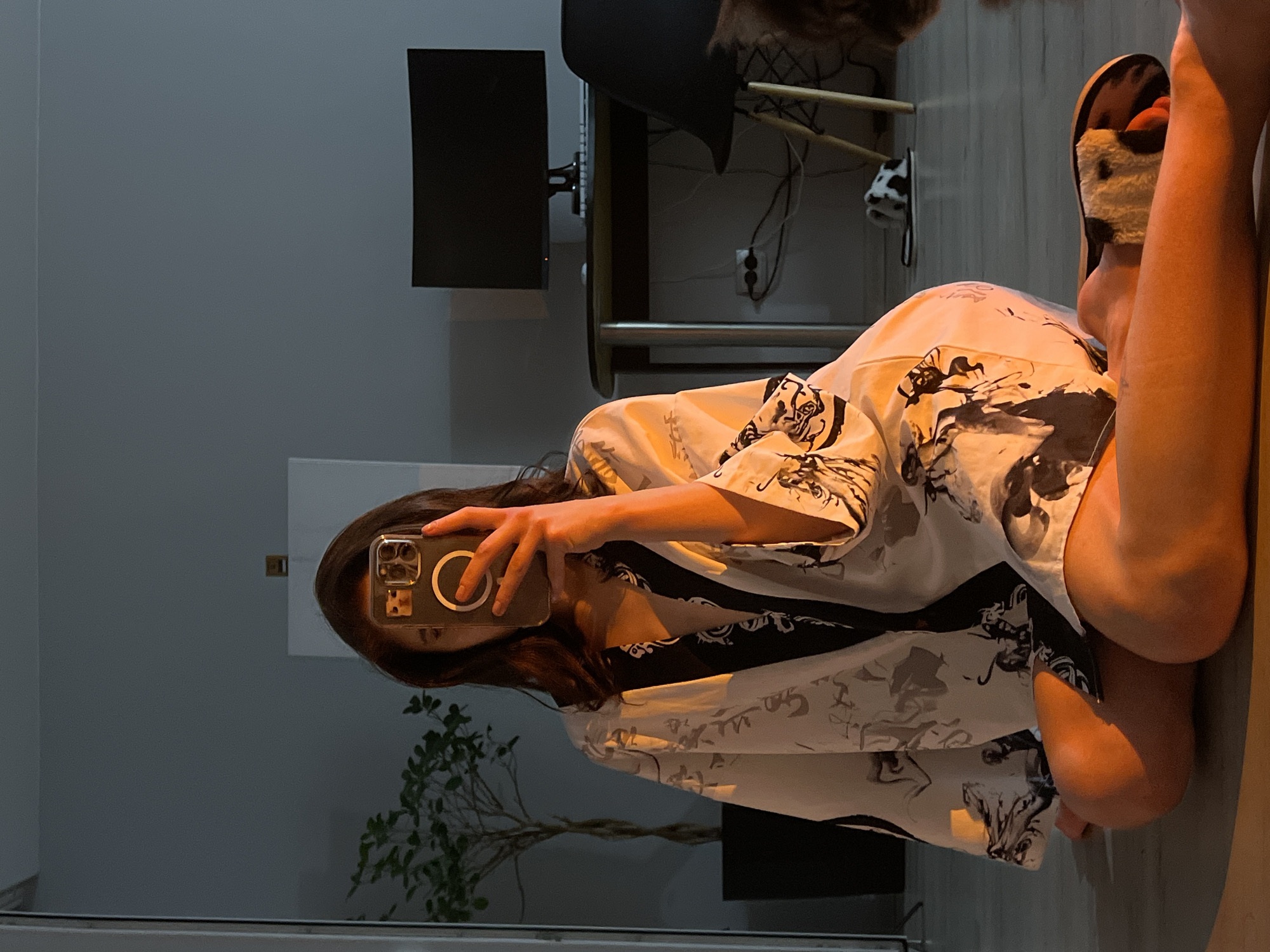 Woman documents outfit changes in Ternopil apartment selfie session