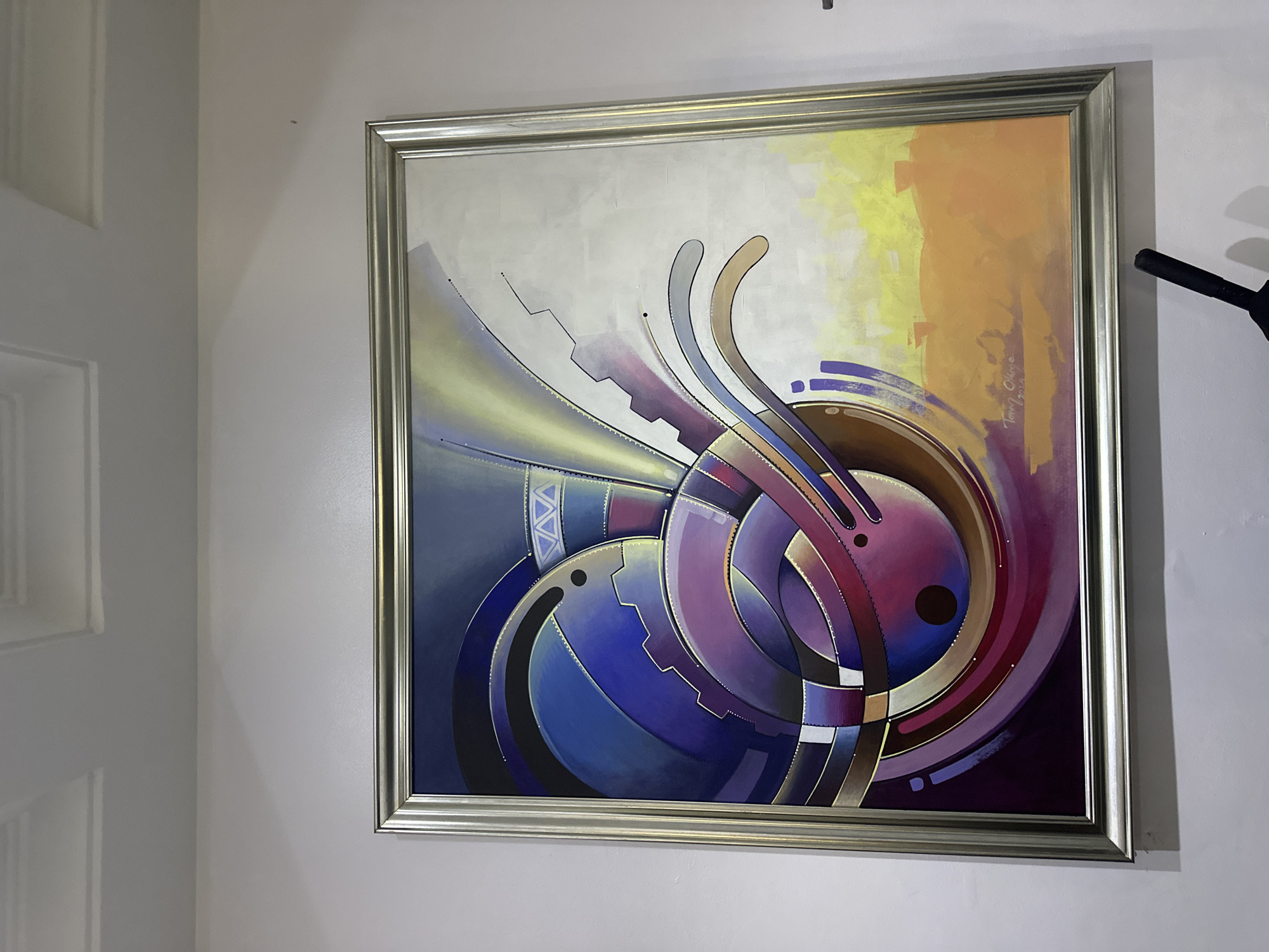 Abstract geometric painting observed on wall in Ilado, Nigeria
