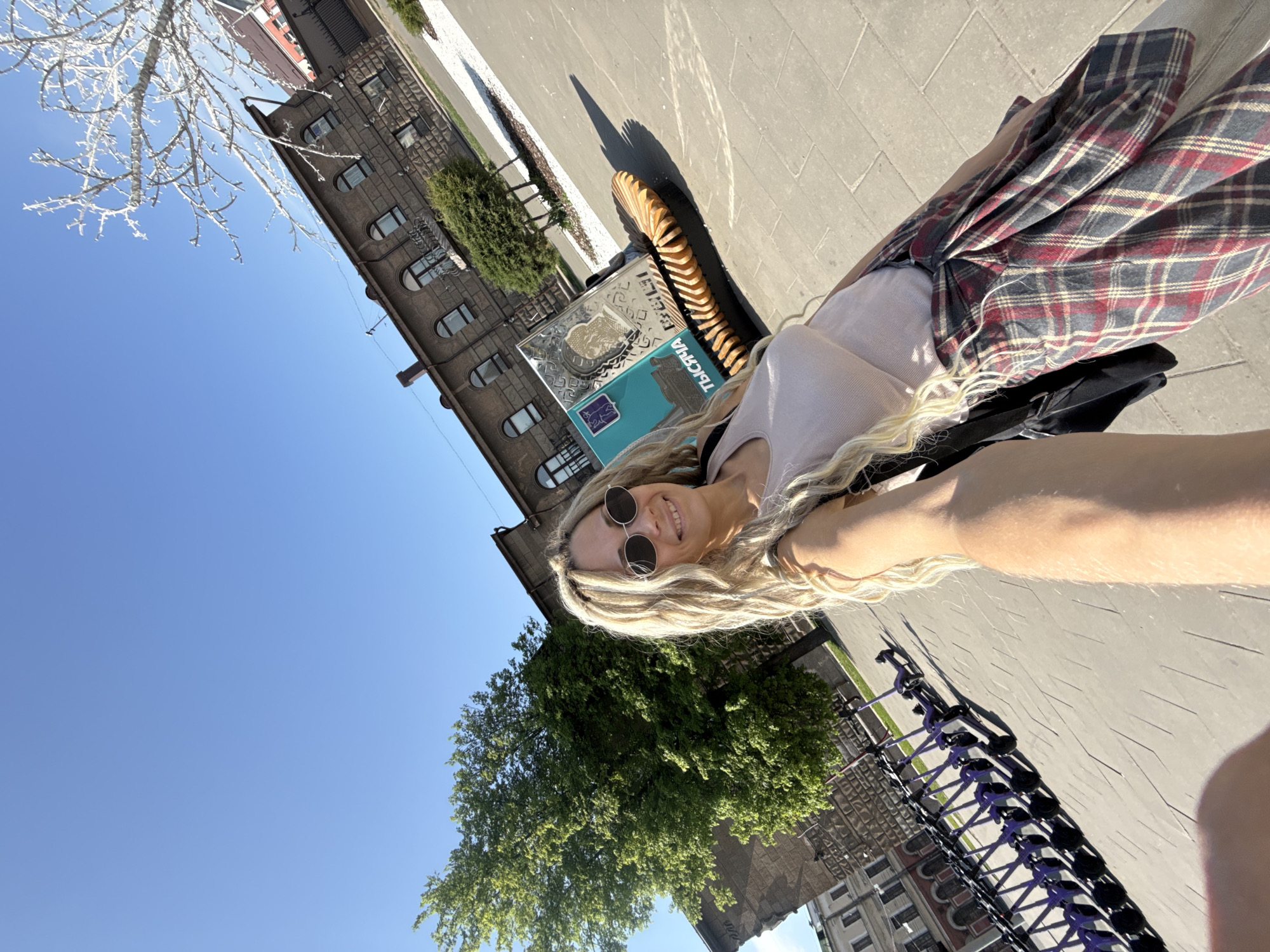 Woman documents sunny spring day across Russian towns