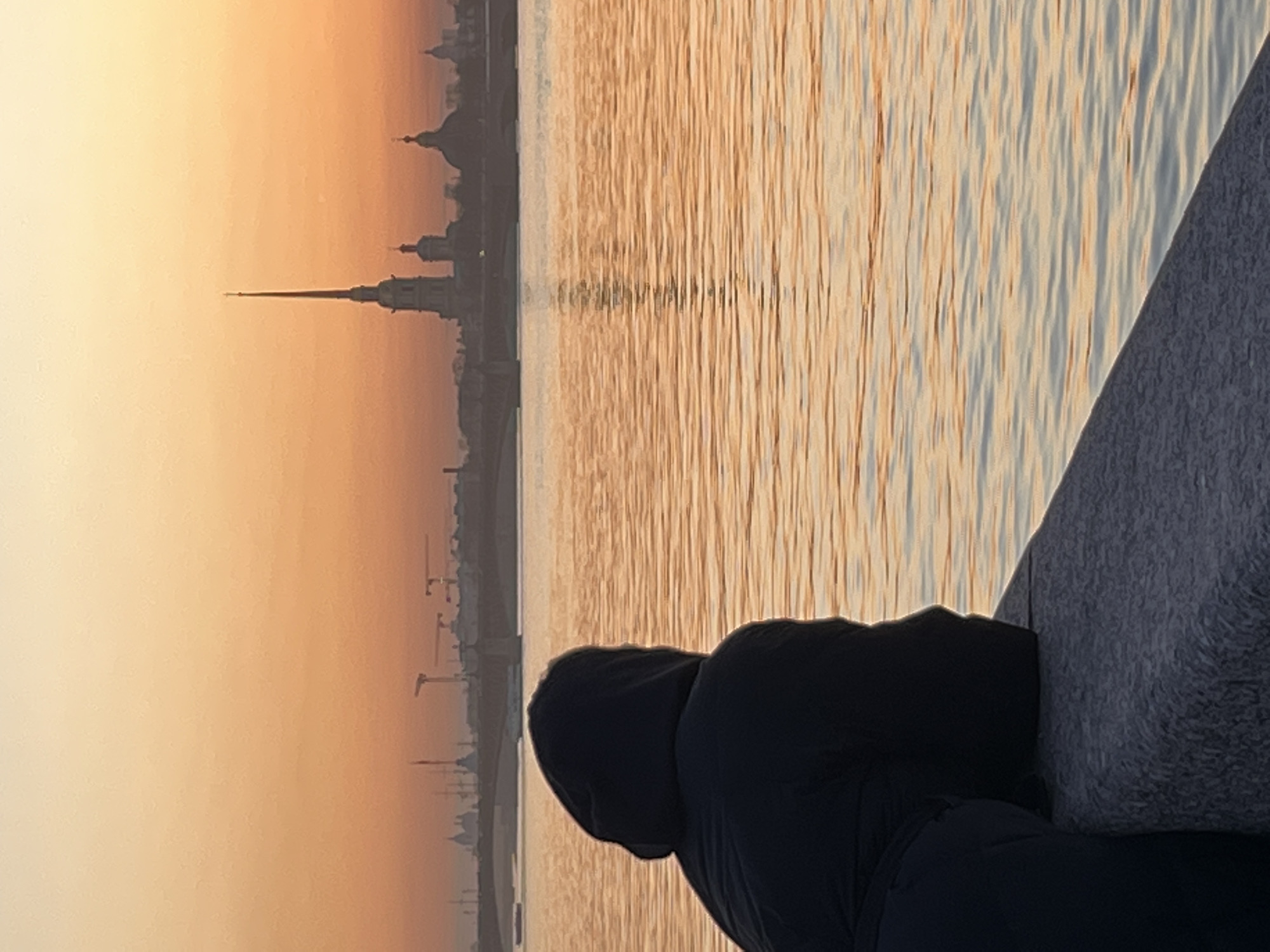 Evening waterfront activities captured along Saint Petersburg's Neva River