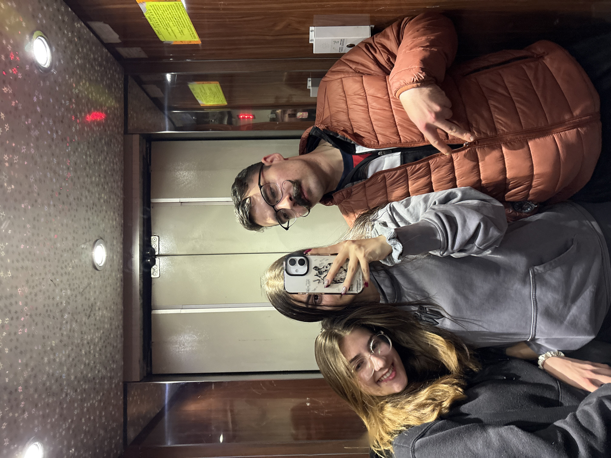 Three people take selfie in Blagoevgrad elevator