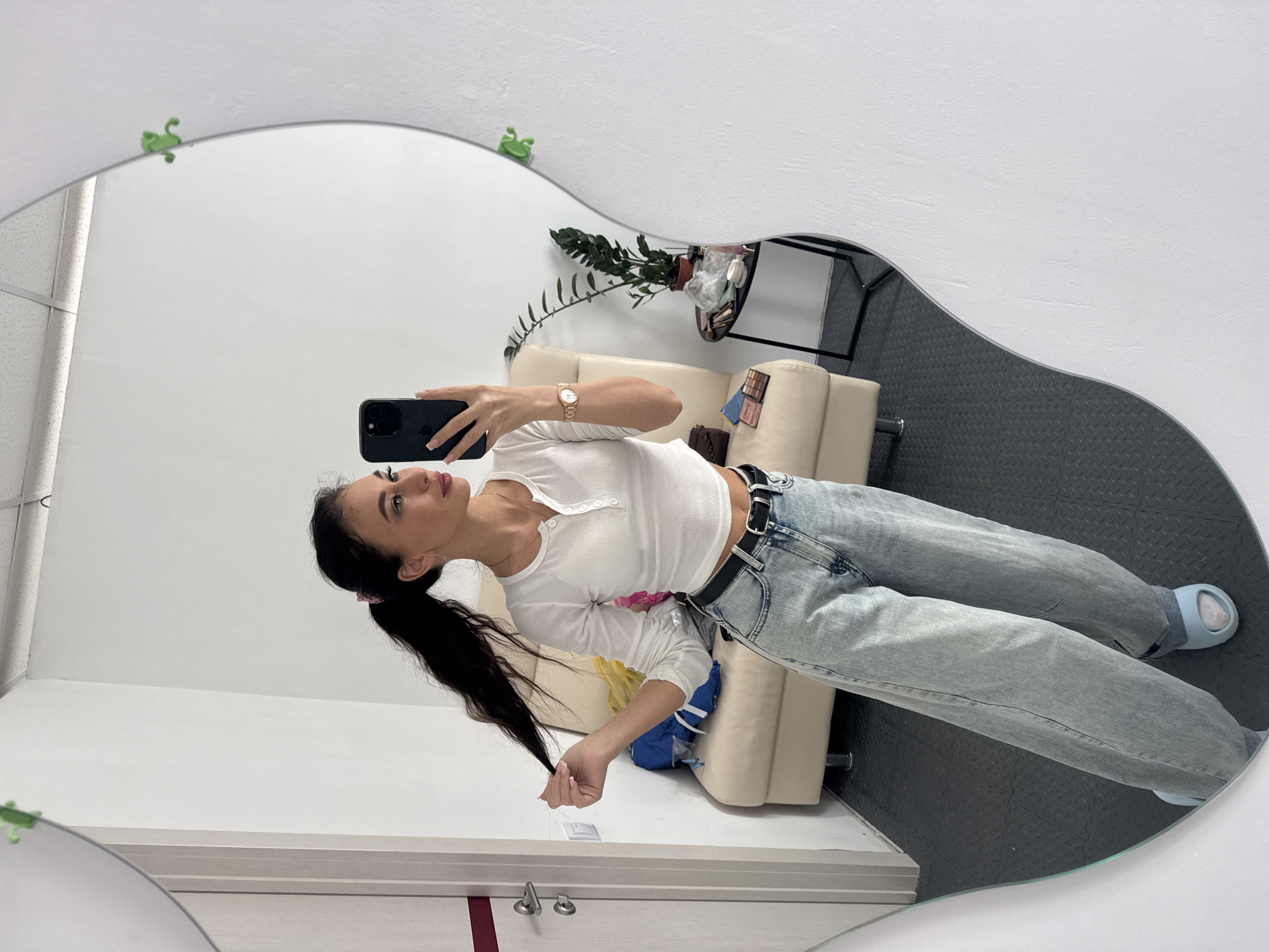Woman takes mirror selfies with decorative frames in Russia