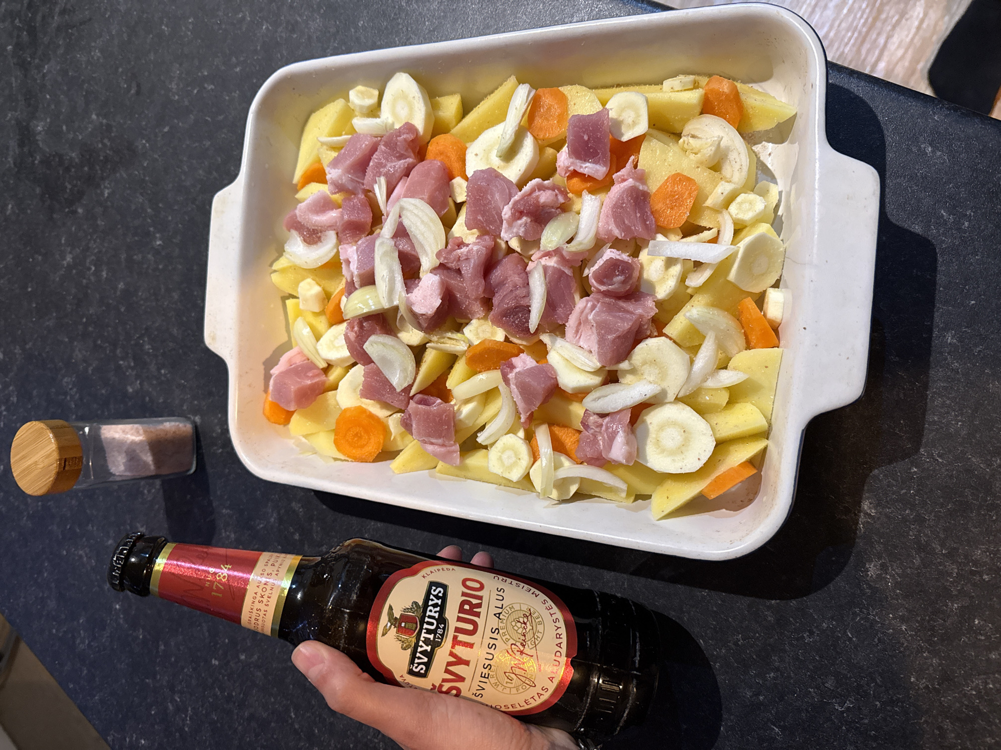 Home cook prepares meat and vegetable dish in Great Yarmouth