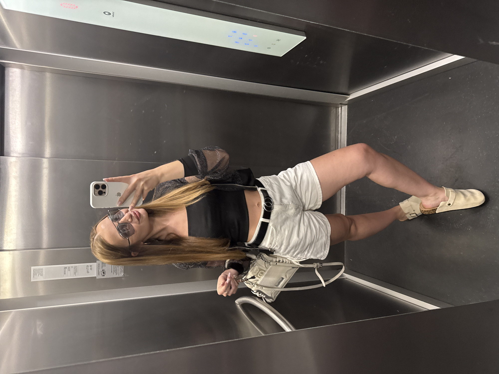 Woman Takes Selfie in Budva Elevator