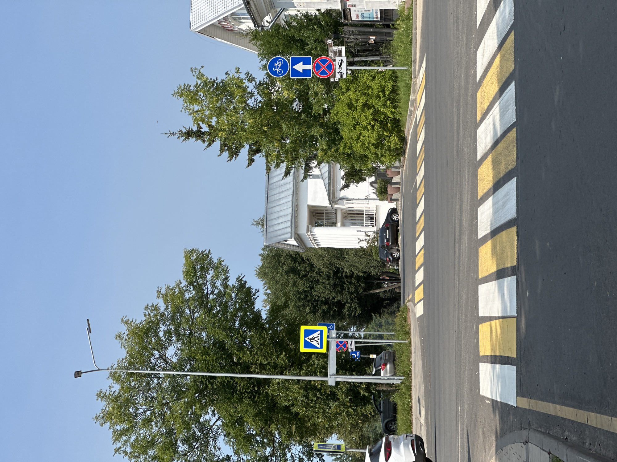 Sunny street crossing in Vasil'ki, Russia