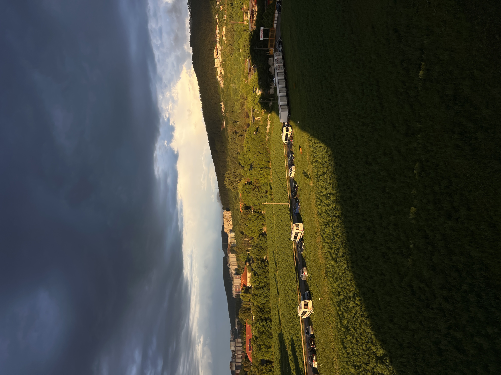 Golden hour hits Florești as storm clouds gather nearby