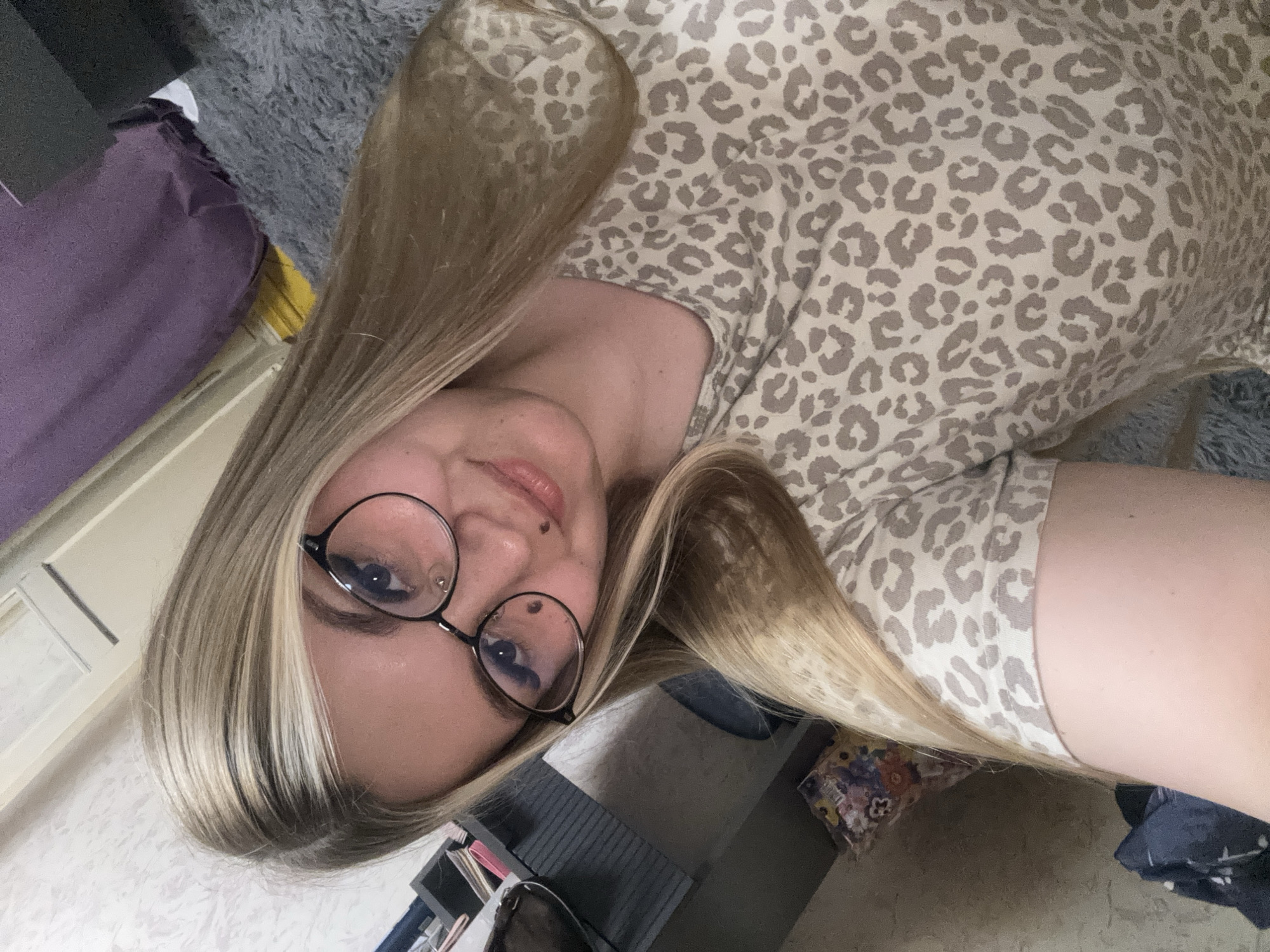 Woman documents evening selfie session at Russian home