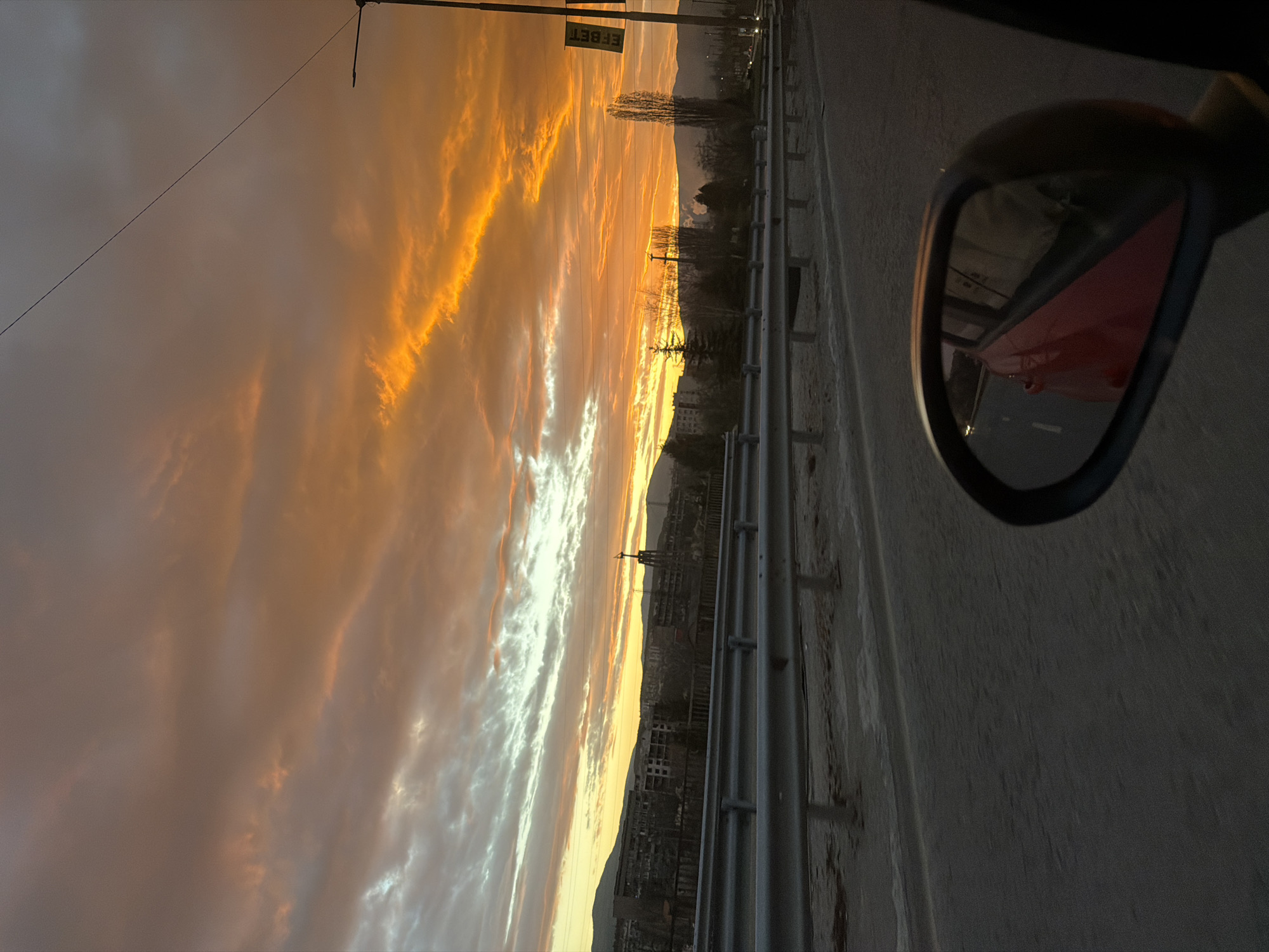 Driver captures sunrise views while traveling through Pernik, Bulgaria