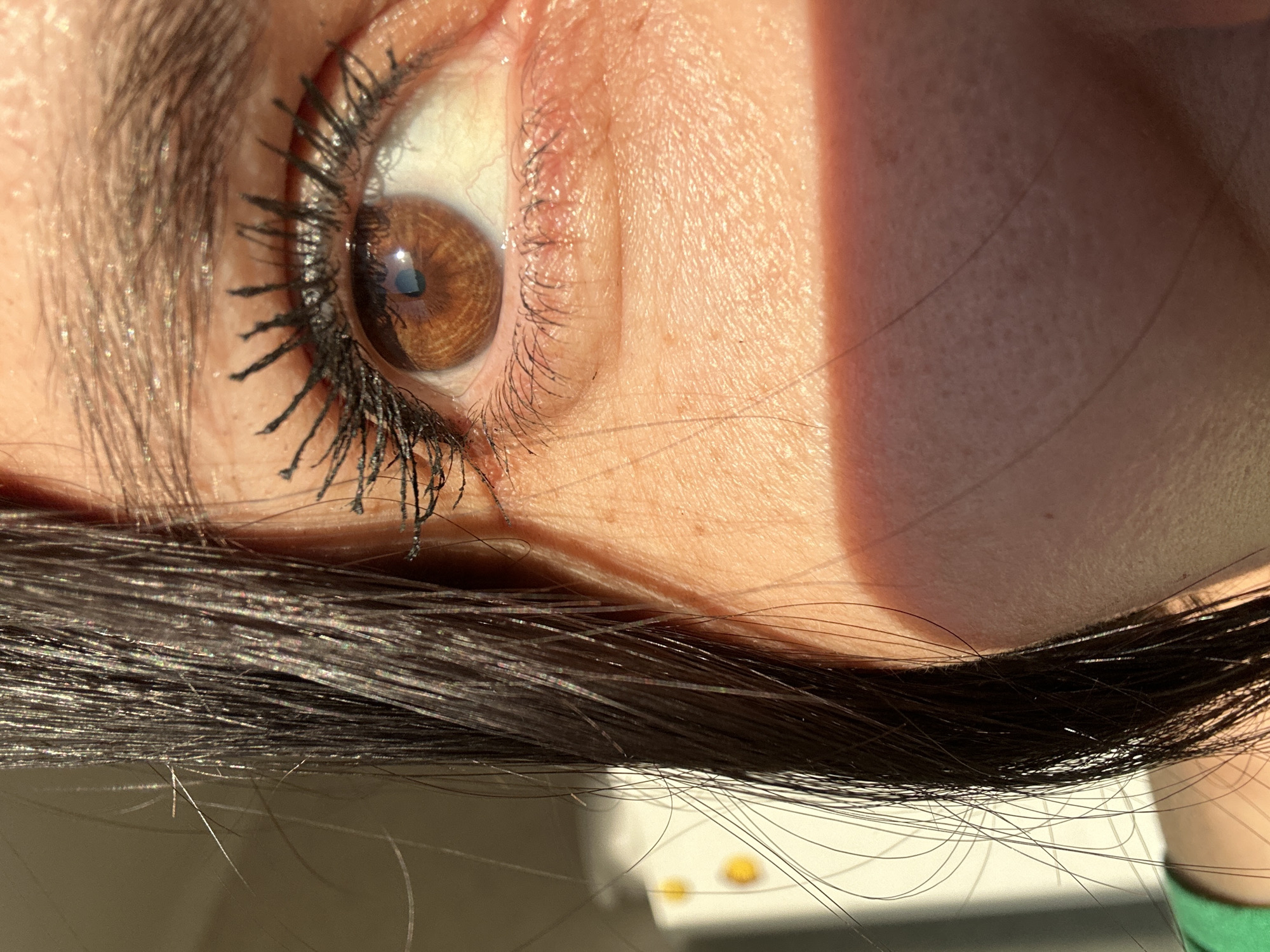 Close-up portrait and sky view captured at same location