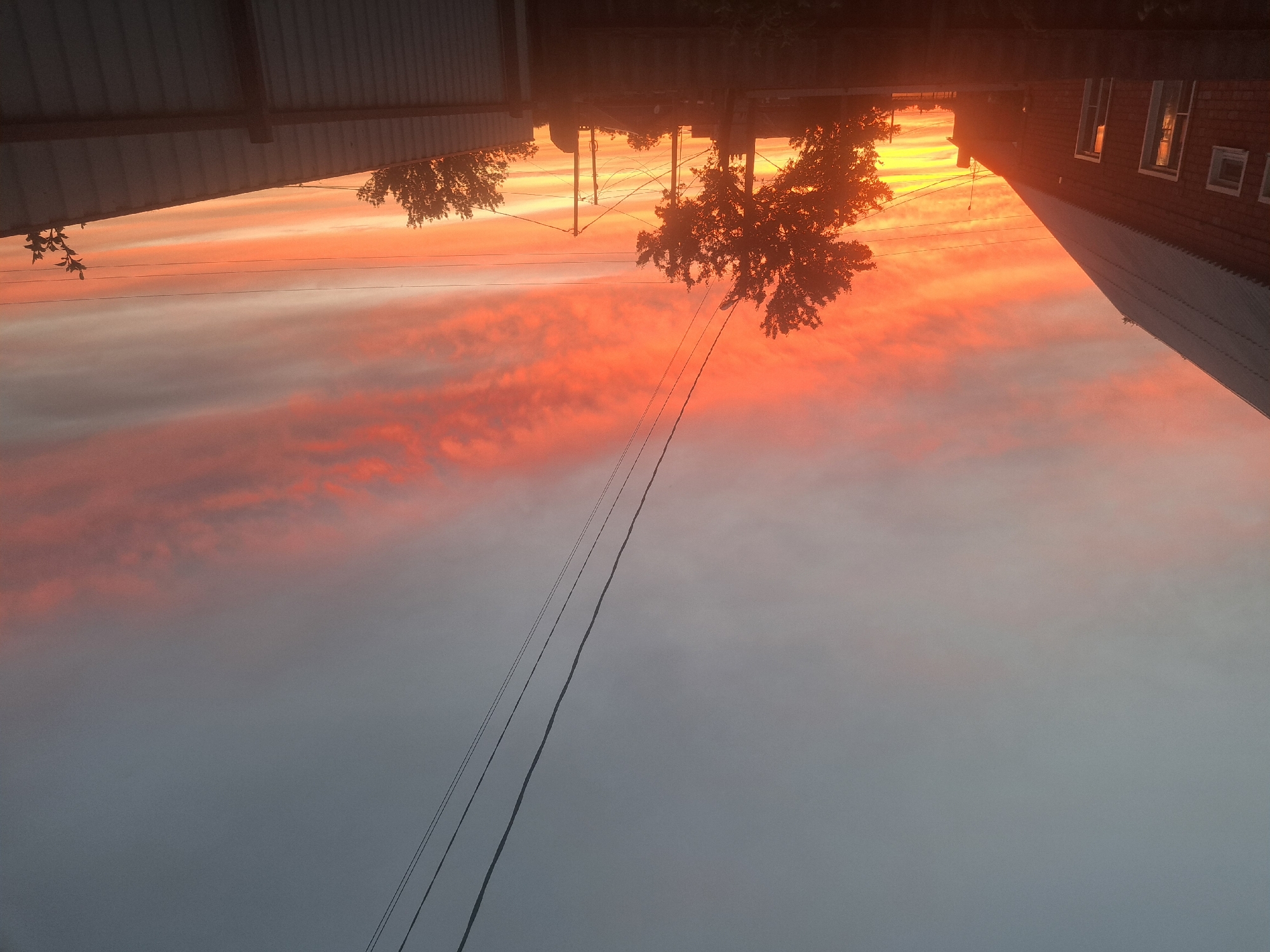 Dramatic sunset captured across Leningradskaya, Russia residential areas