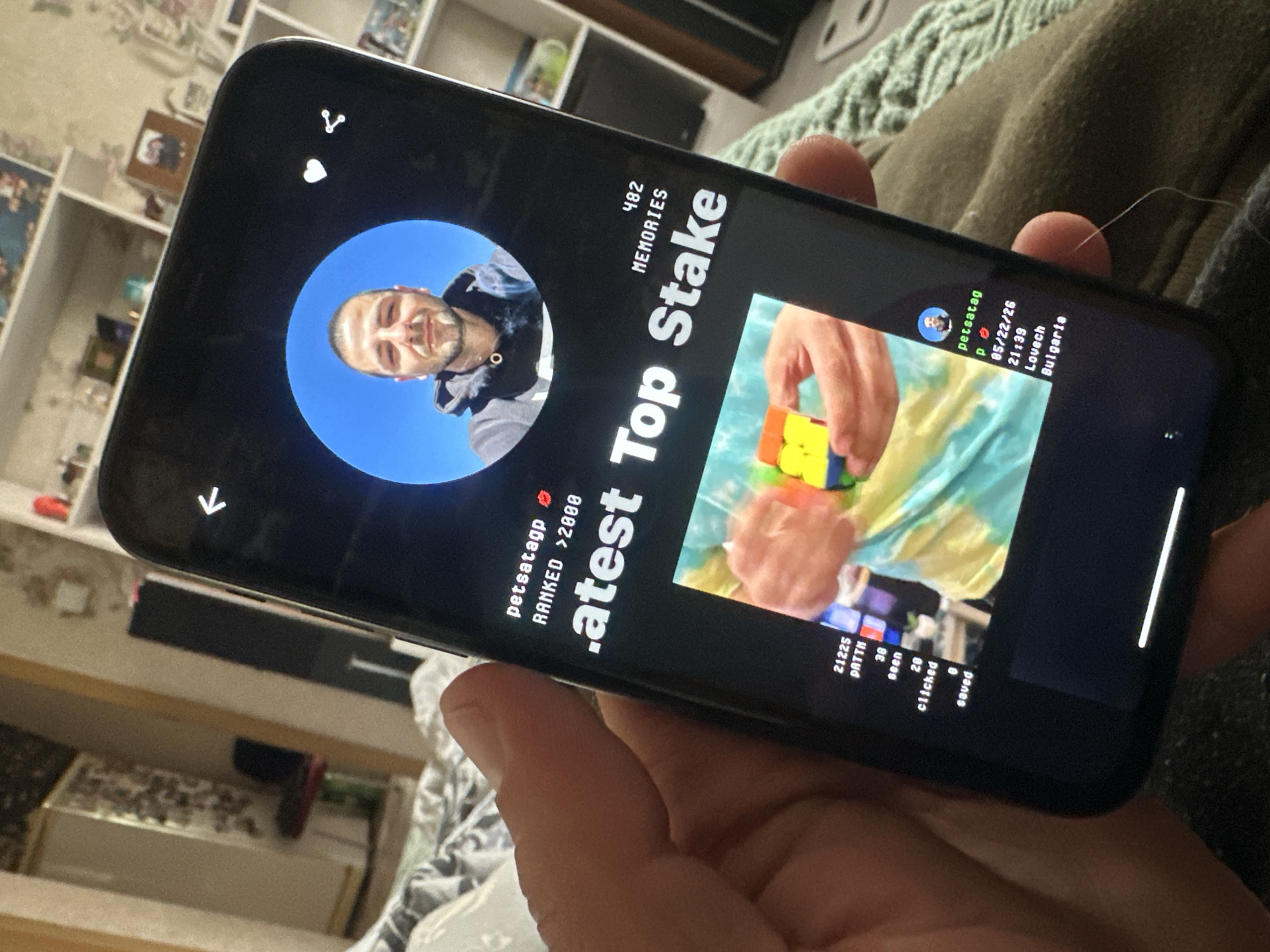 Smartphone user views profile app in Bulgarian village