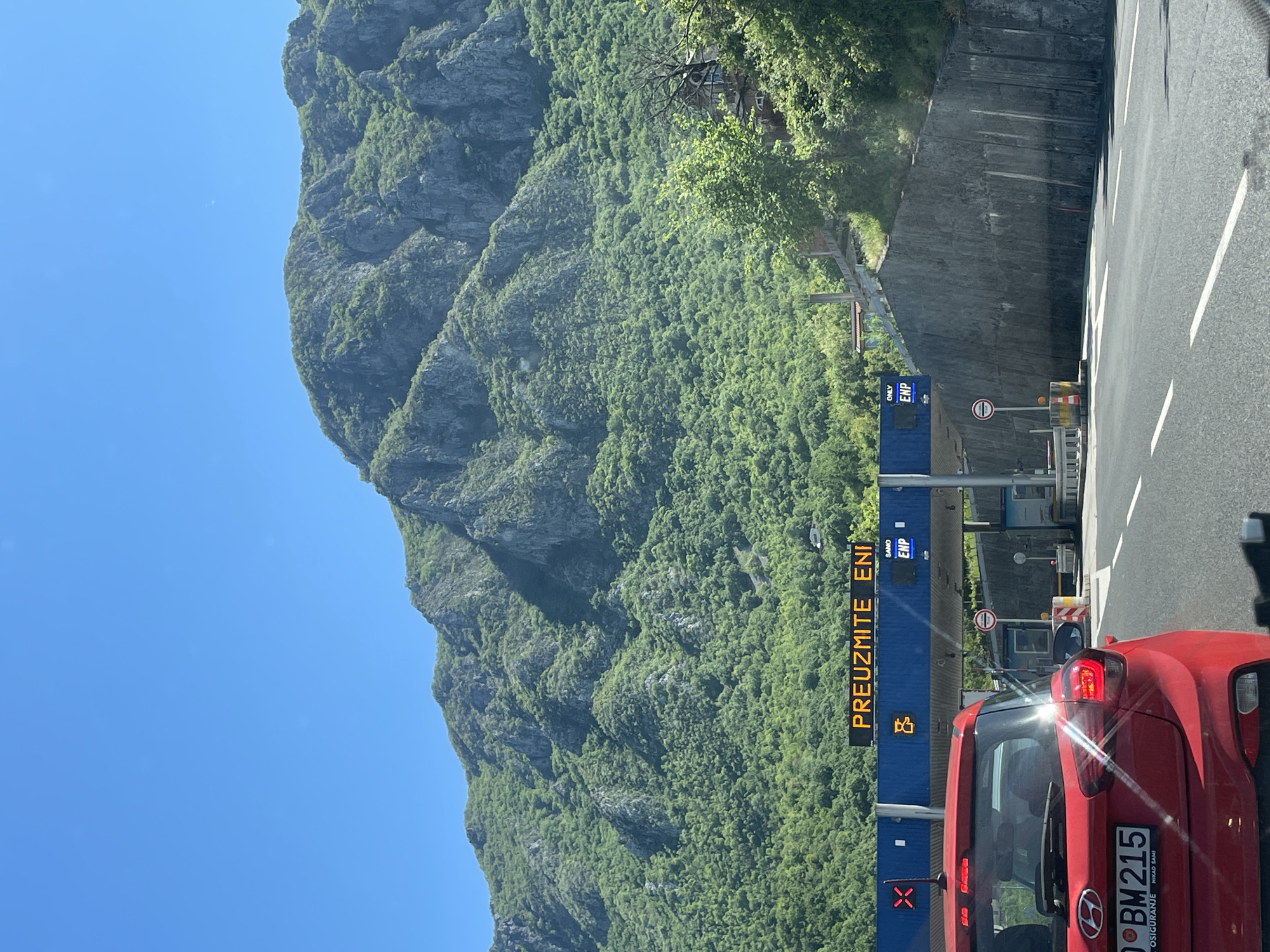 Red car at Montenegro mountain highway toll booth
