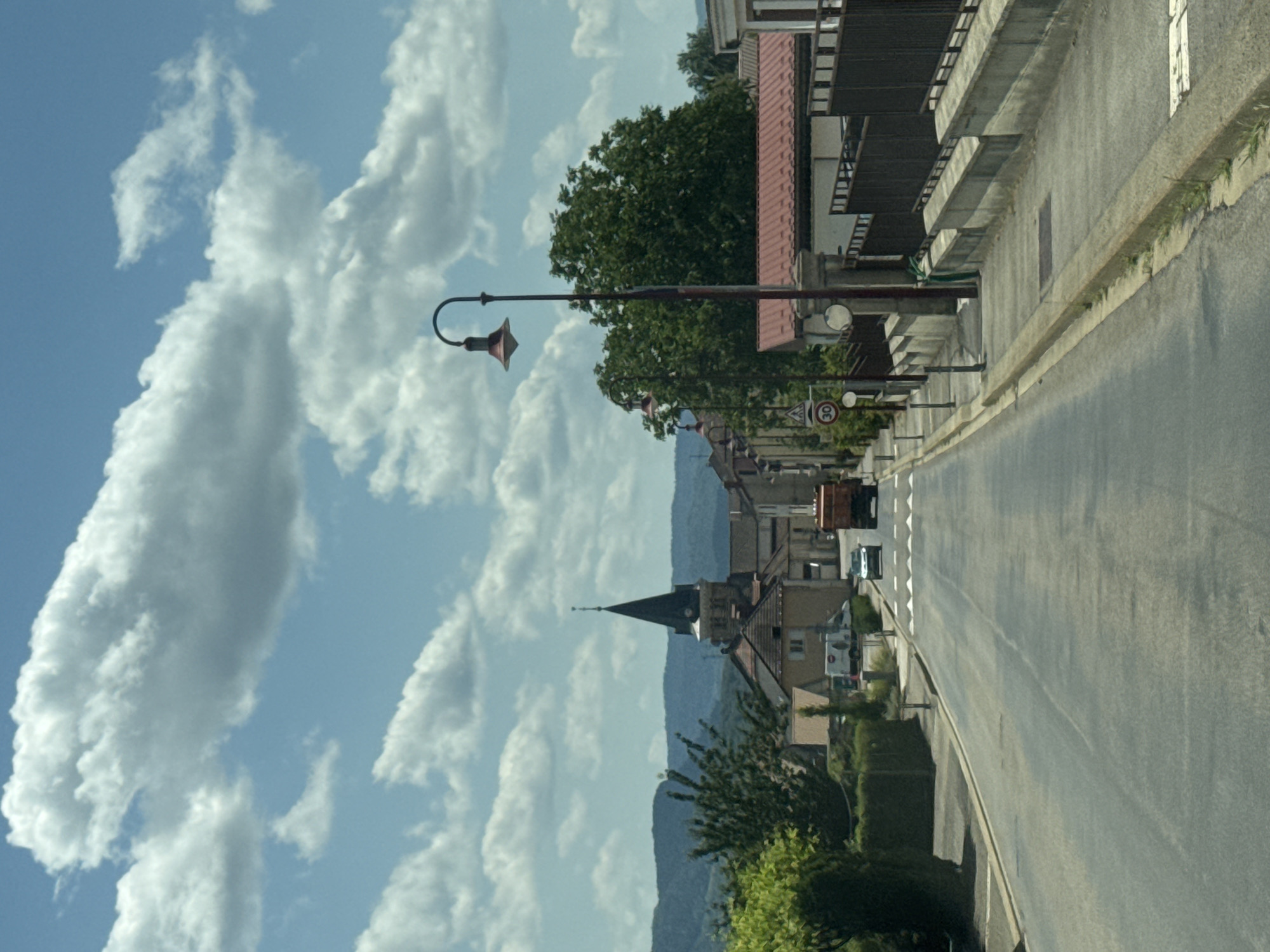 Sunny street views through Coteaux du Lizon, rural France