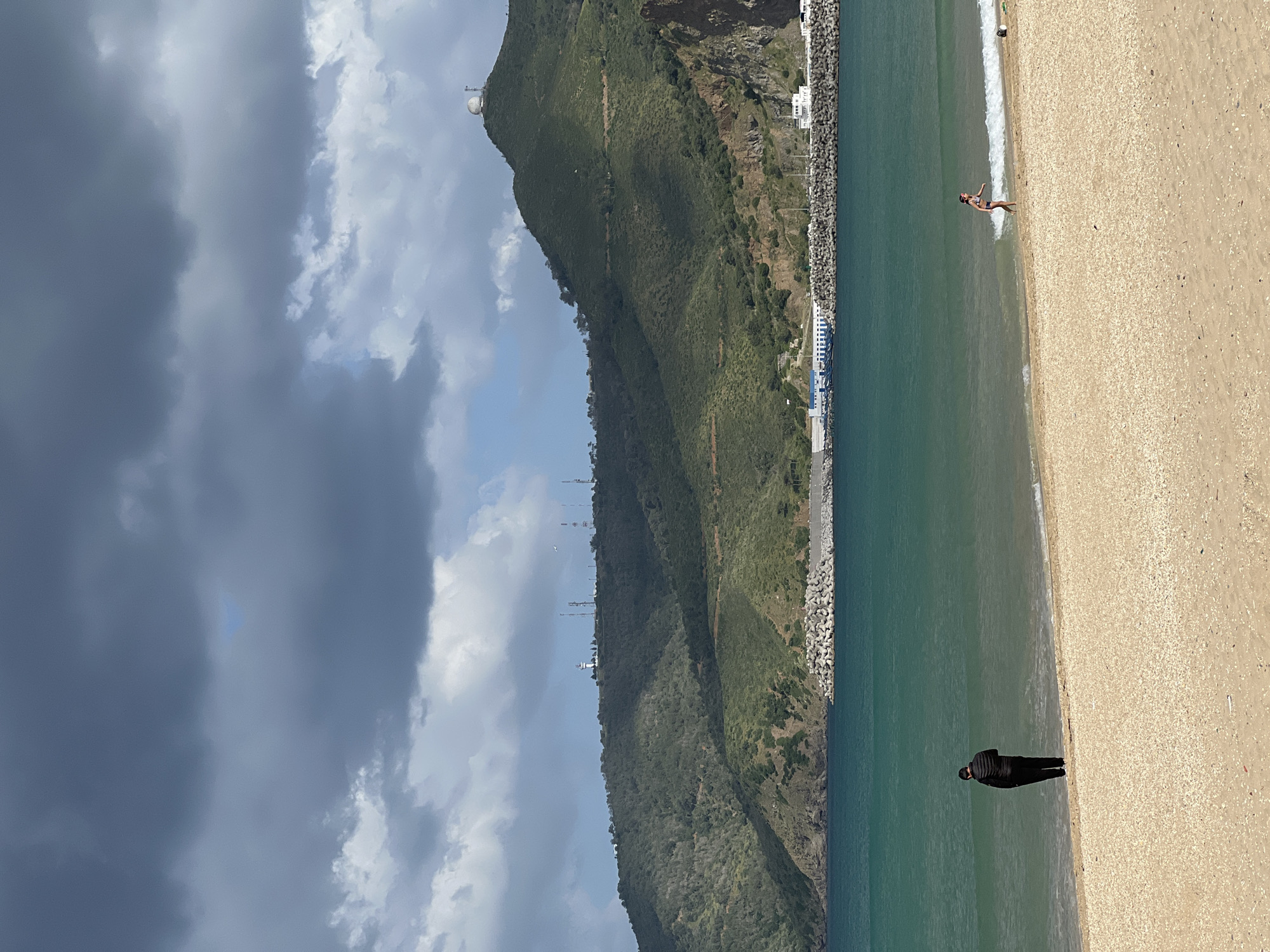 Beachgoers enjoy afternoon at M'Diq despite stormy skies