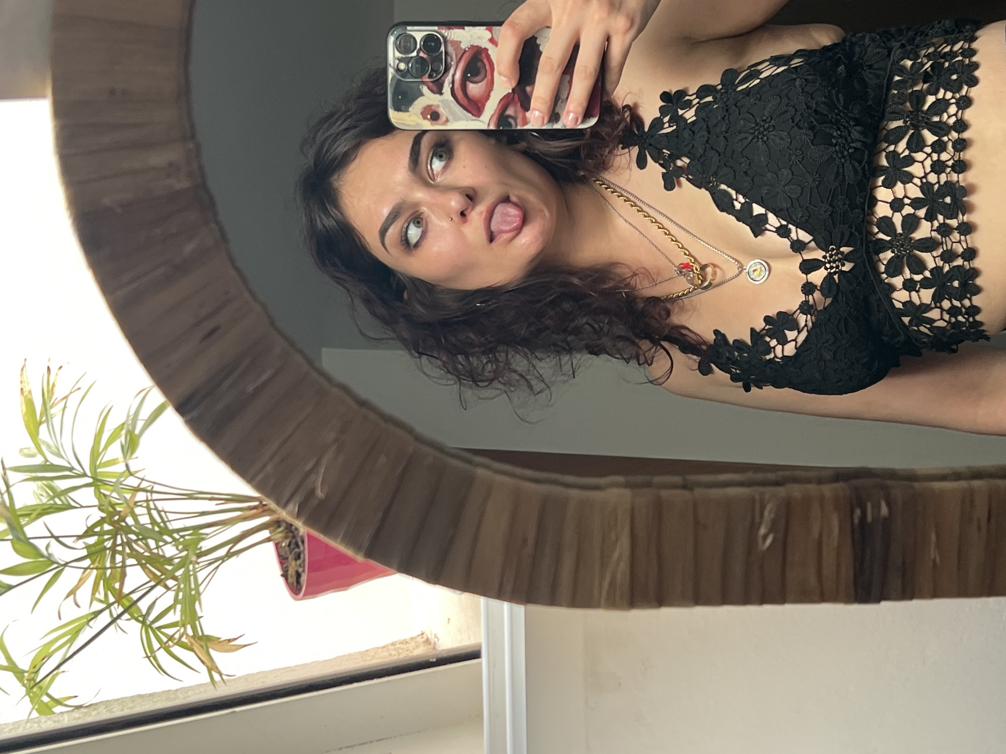Woman documents afternoon with selfies, landmarks in Picassent, Spain