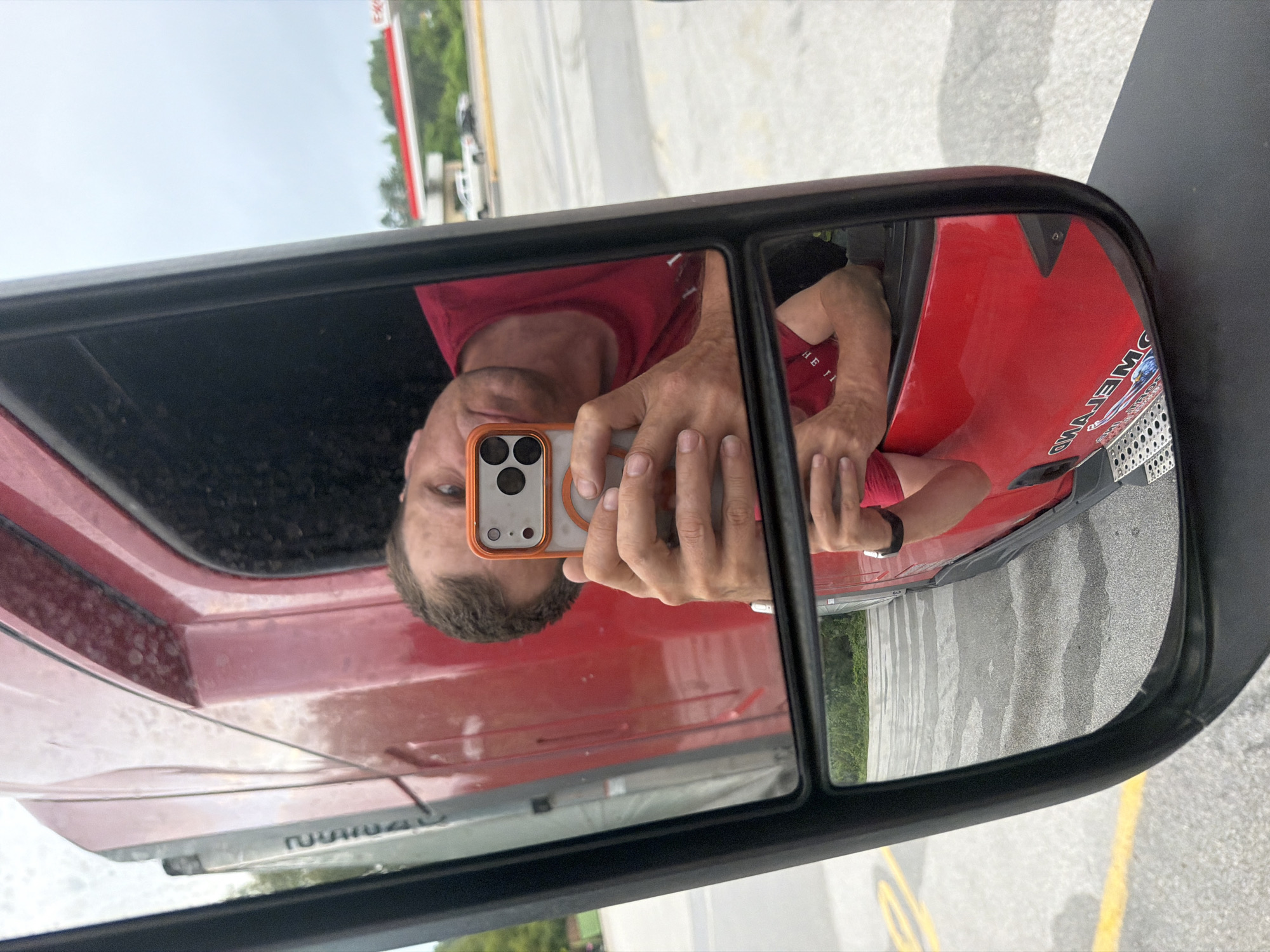 Red Freightliner trucks up at a Wildwood Exxon stop