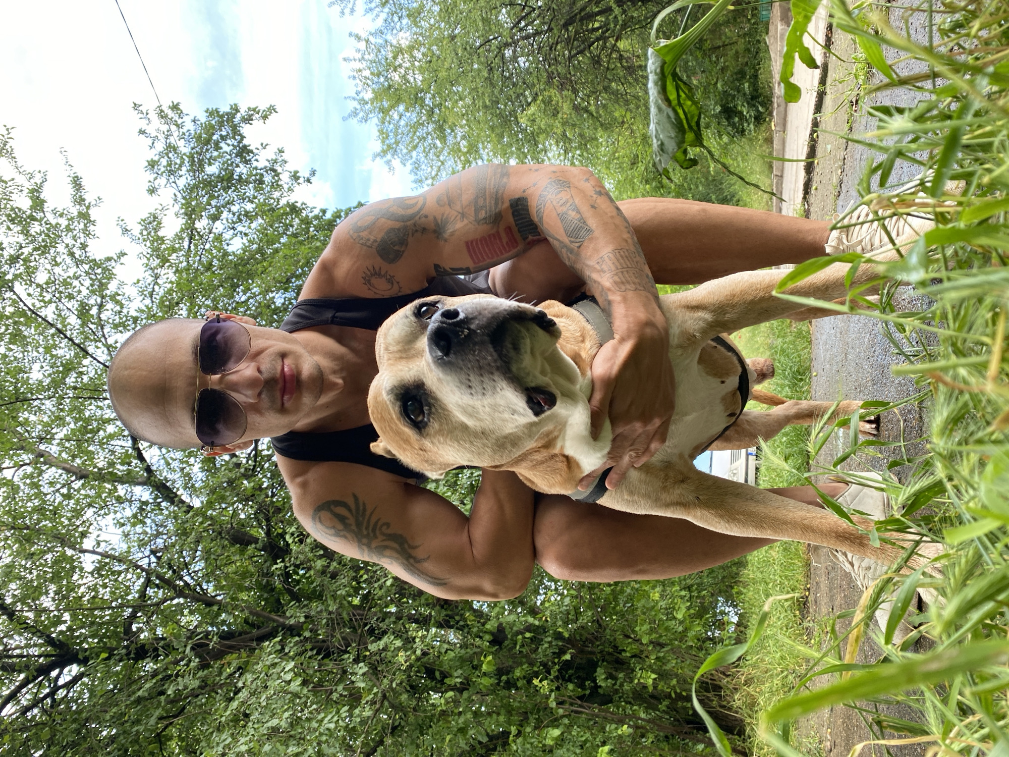 Man and dog photographed outdoors in Pleven, Bulgaria