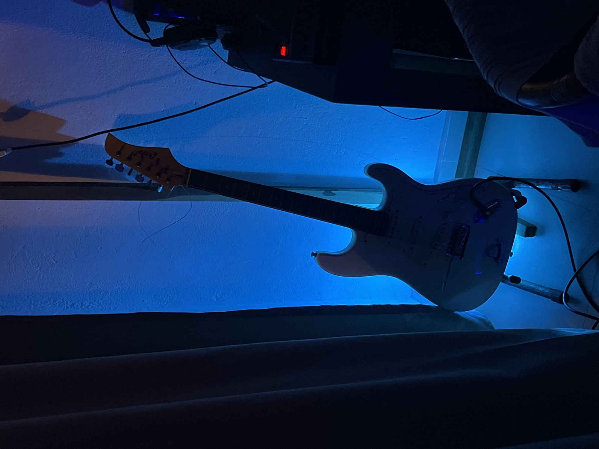 Home music studio with guitar, equipment documented in Goviyapana