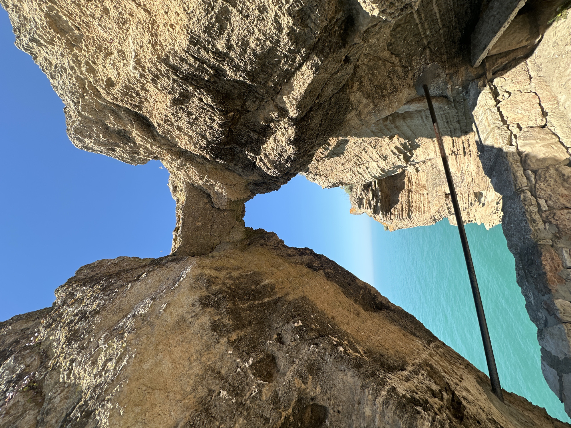 Tourist captures scenic view through Cape Kaliakra rock formation