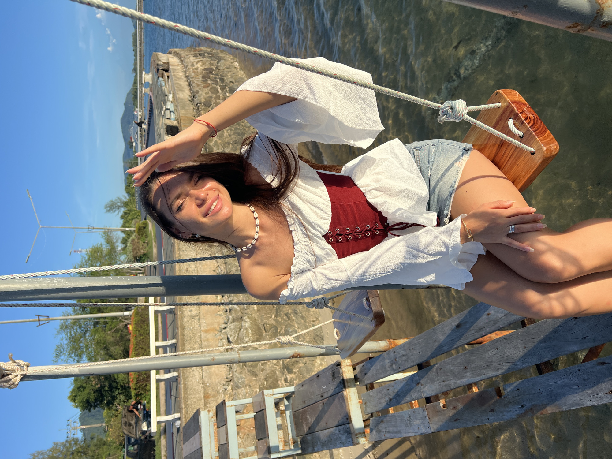 Tourist photo session captured at Nathon waterfront during sunset