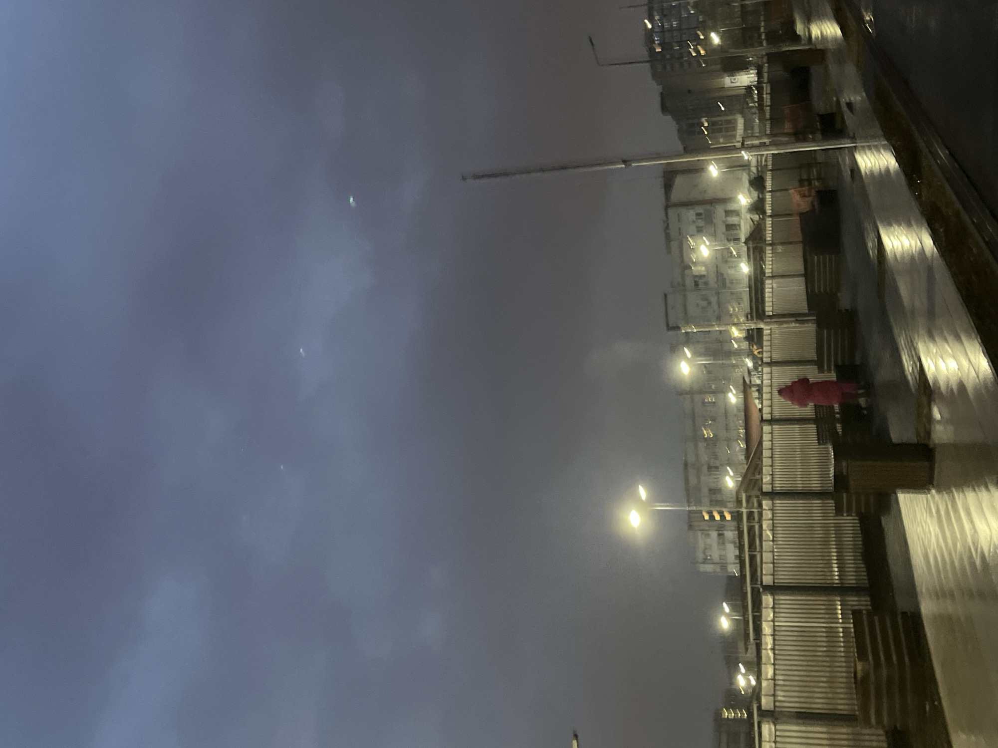Woman takes evening selfies in snowy Saint Petersburg