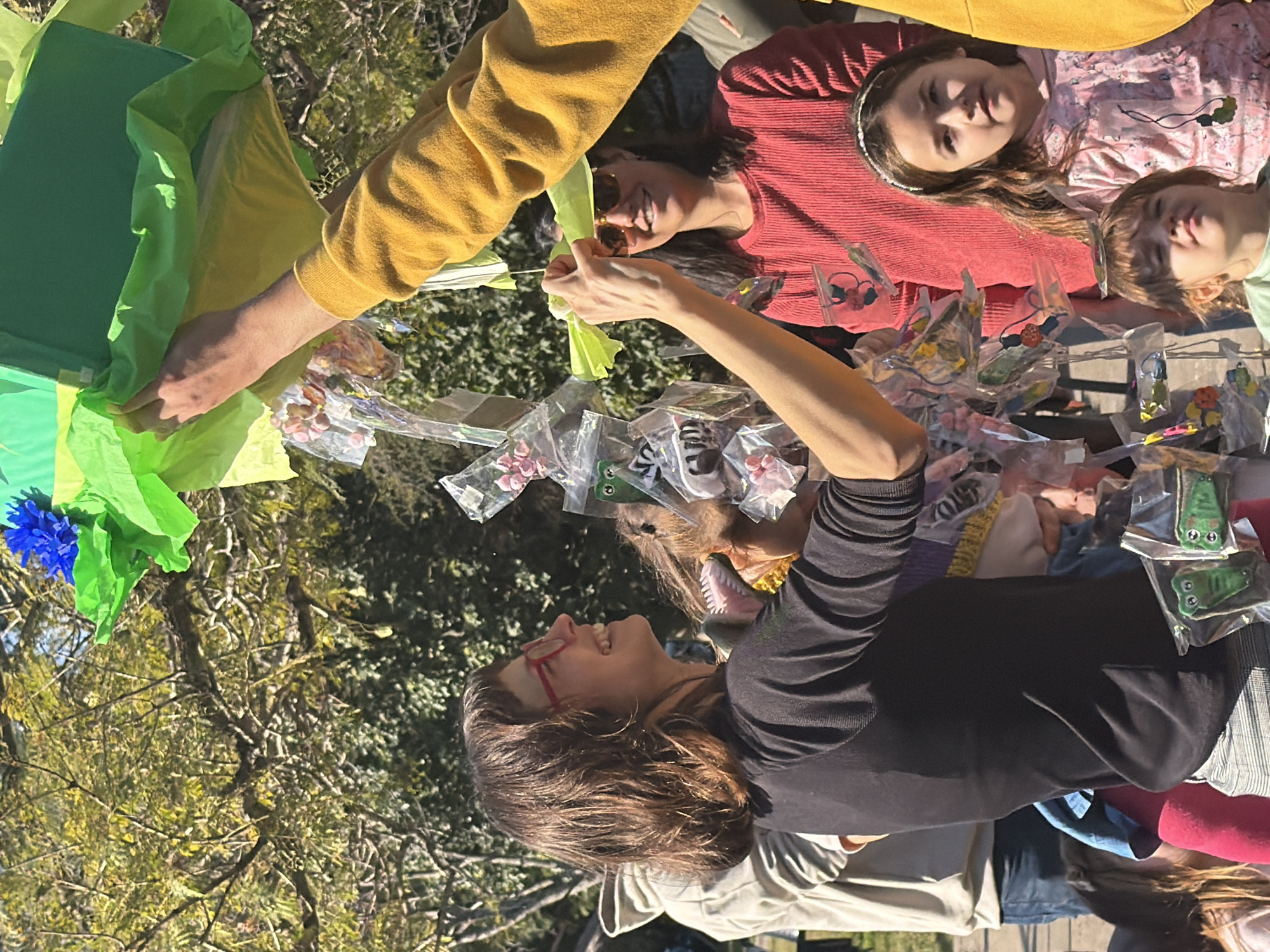 Children celebrate Lila's dinosaur-themed birthday party in Melchor Romero
