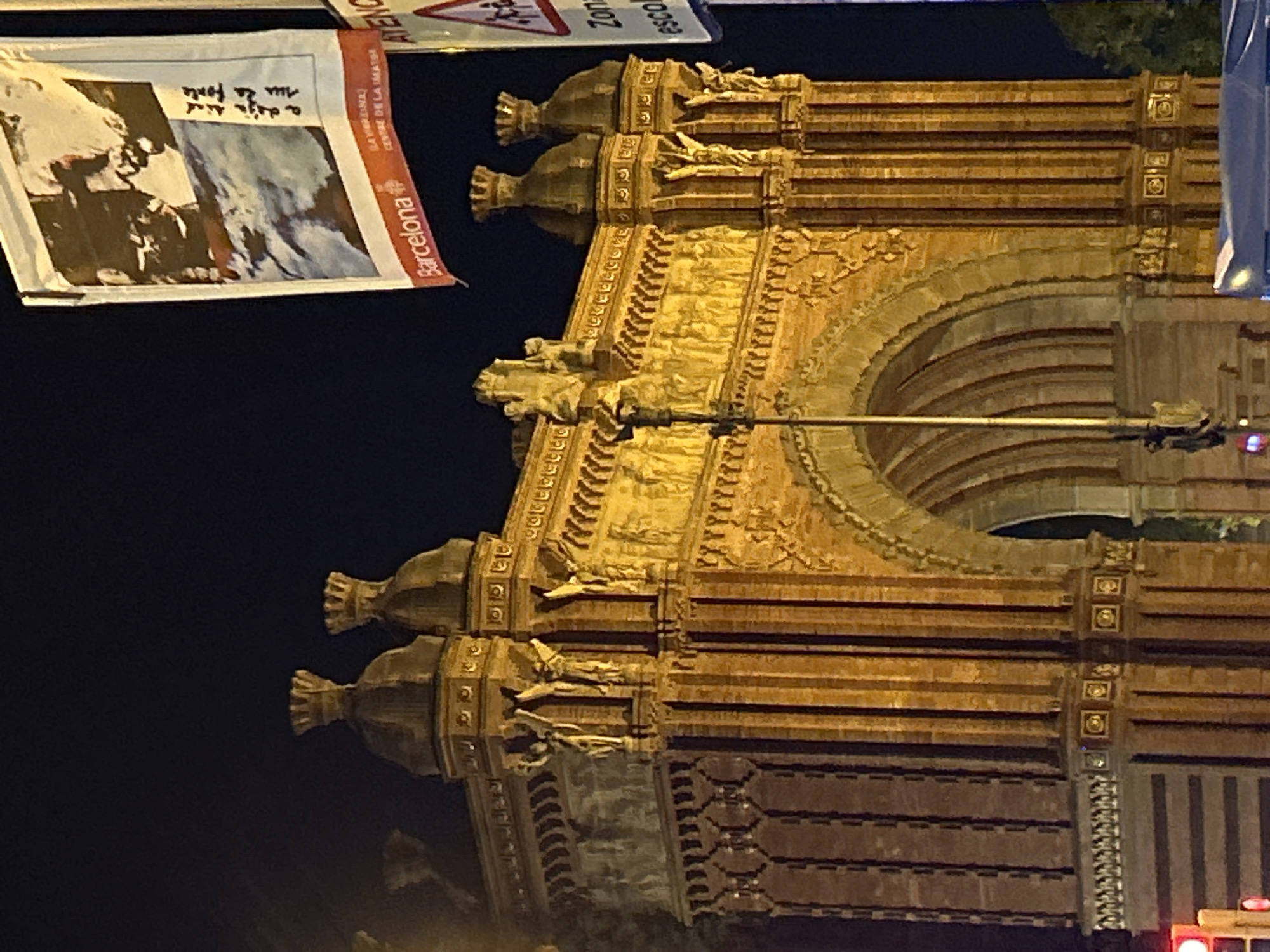 Arc de Triomf illuminated at night in Barcelona