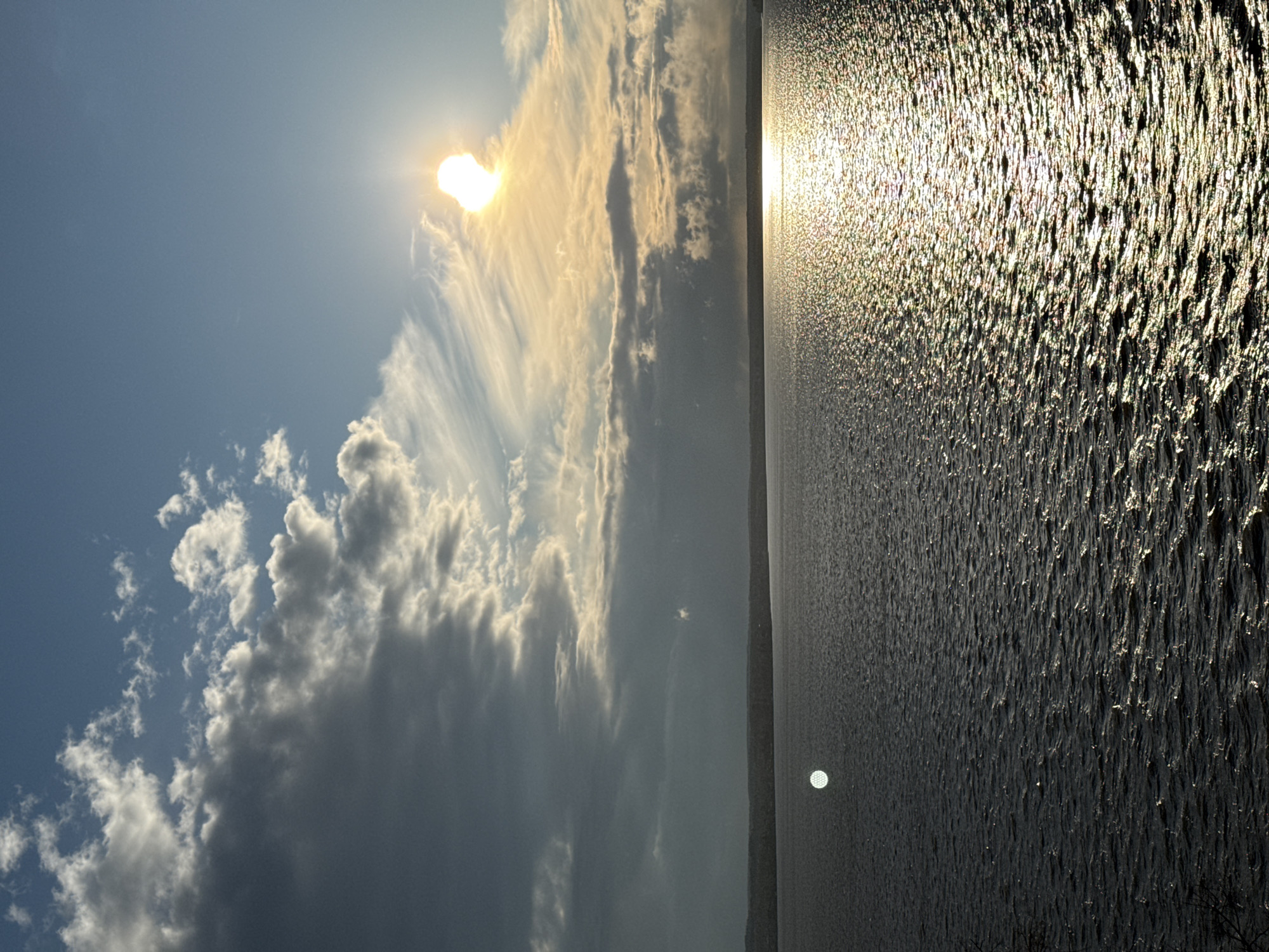 Witness documents sunlit reservoir views near Votkinsk, Russia