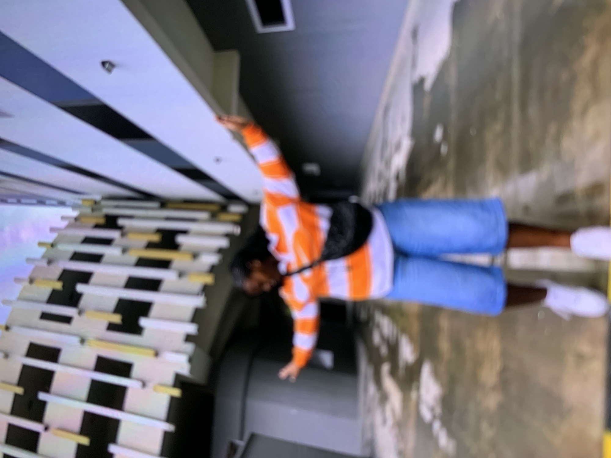 Museum visitor explores exhibits at Tanzania National Museum