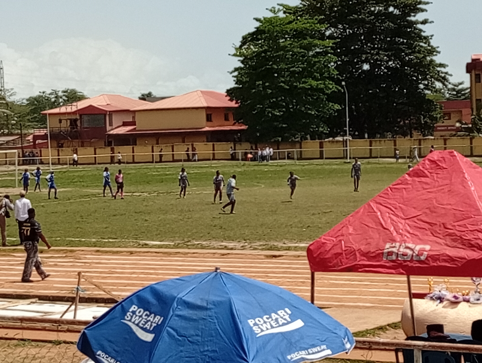 Soccer match in progress with players and spectators