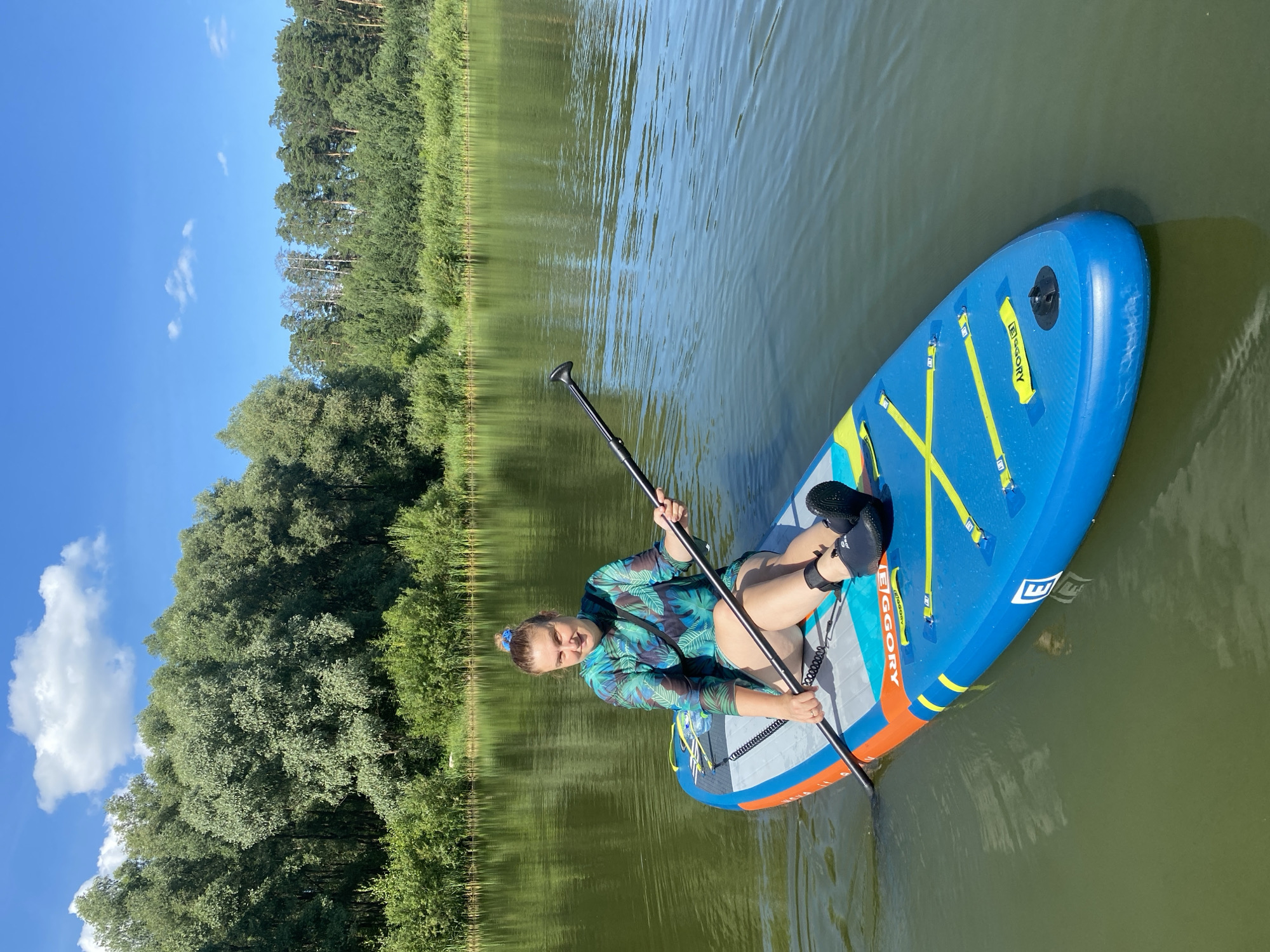 Paddleboarding on a calm lake near Kazan