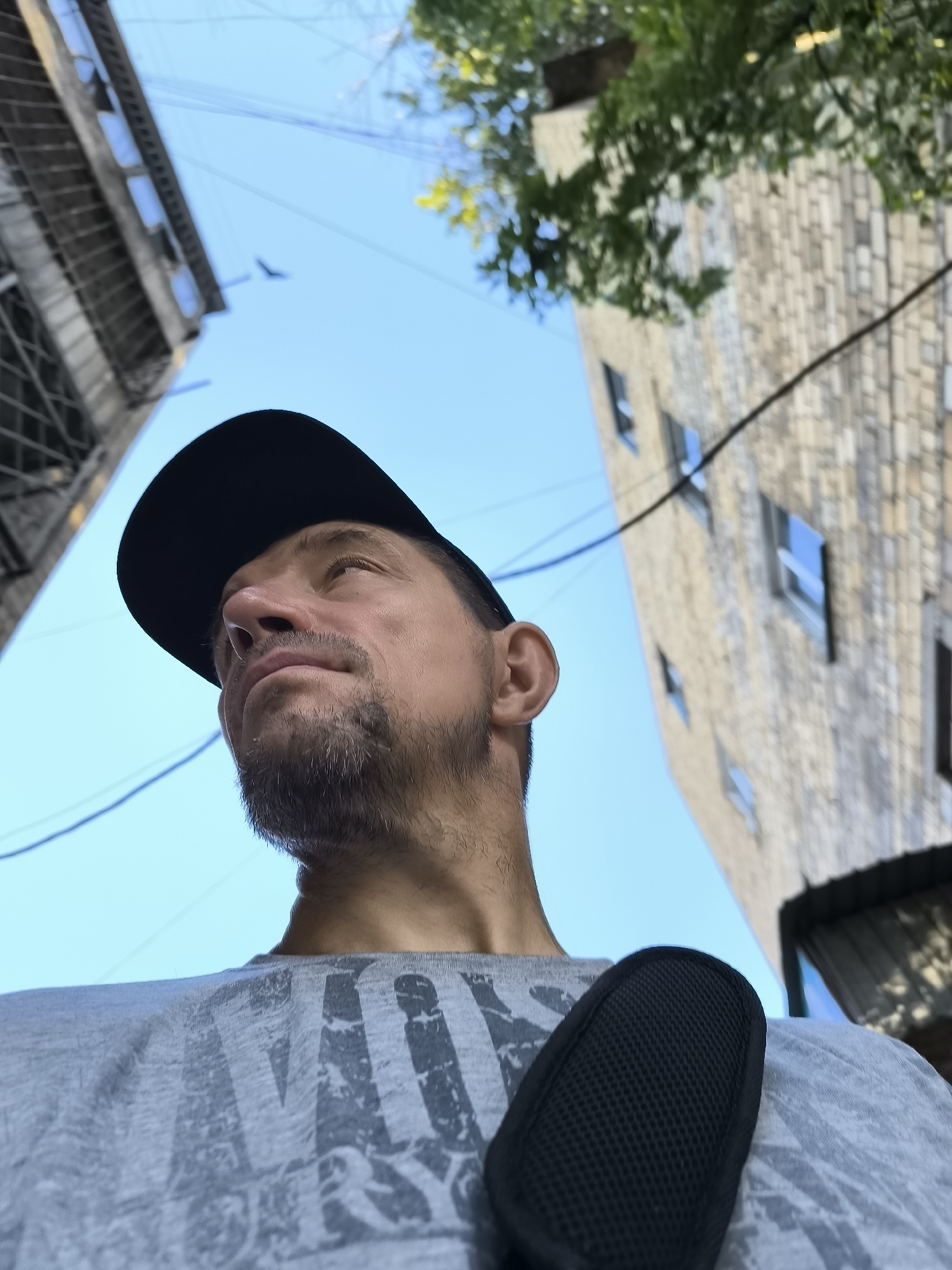 Repeated upward gaze caught from multiple angles in Karaganda