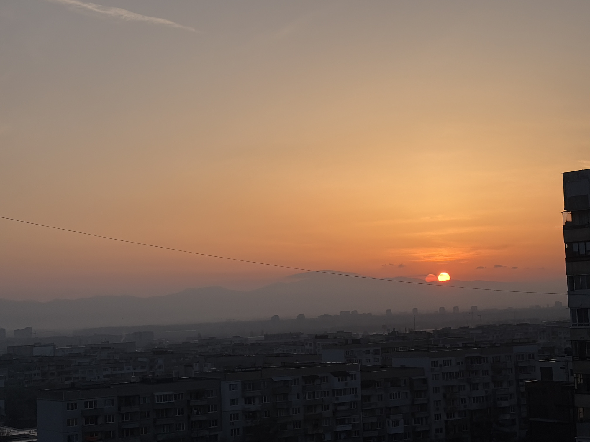 Dawn or dusk cityscape captured over Sofia, Bulgaria