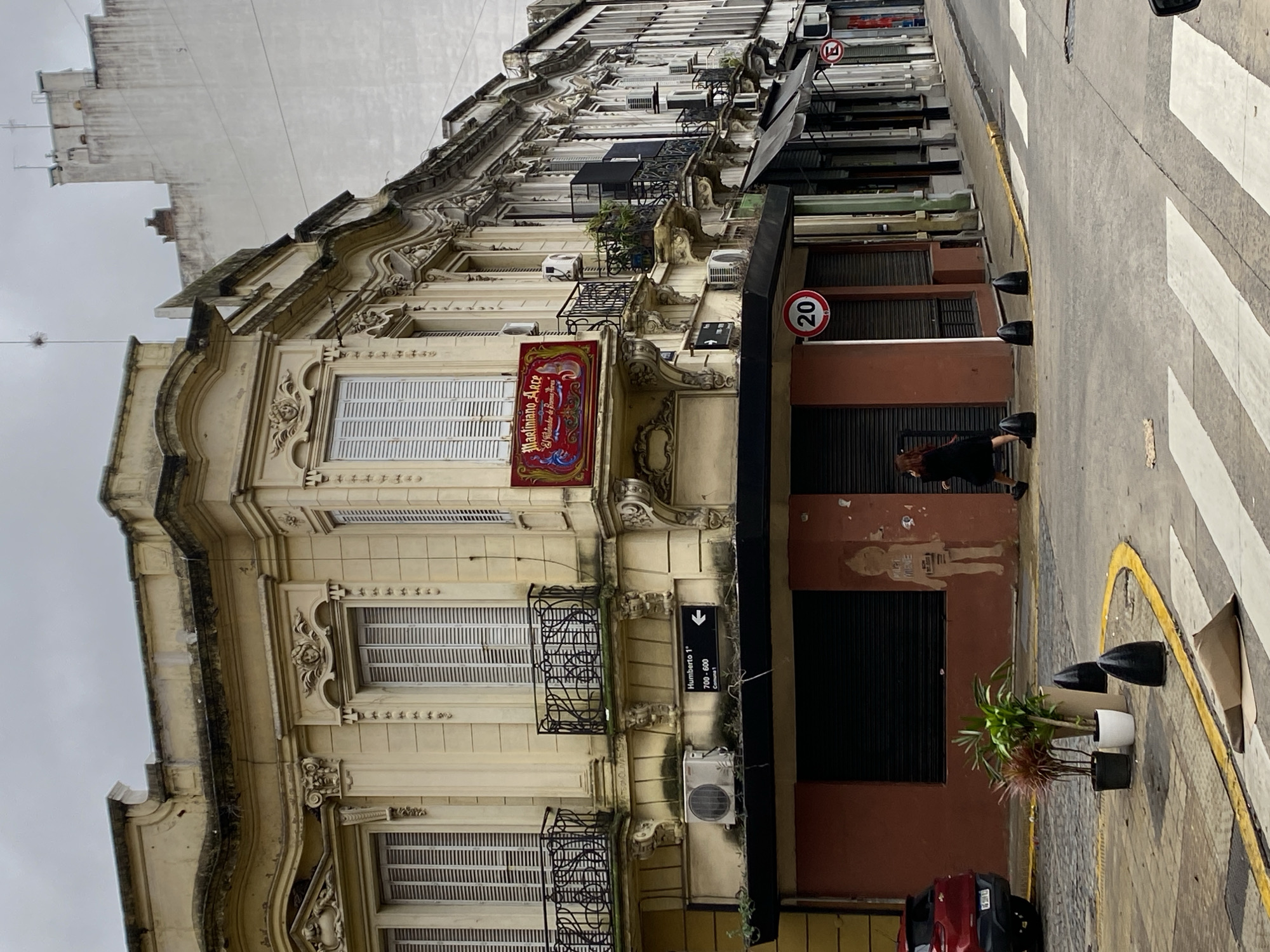 Woman takes selfie in illuminated mirror in Buenos Aires
