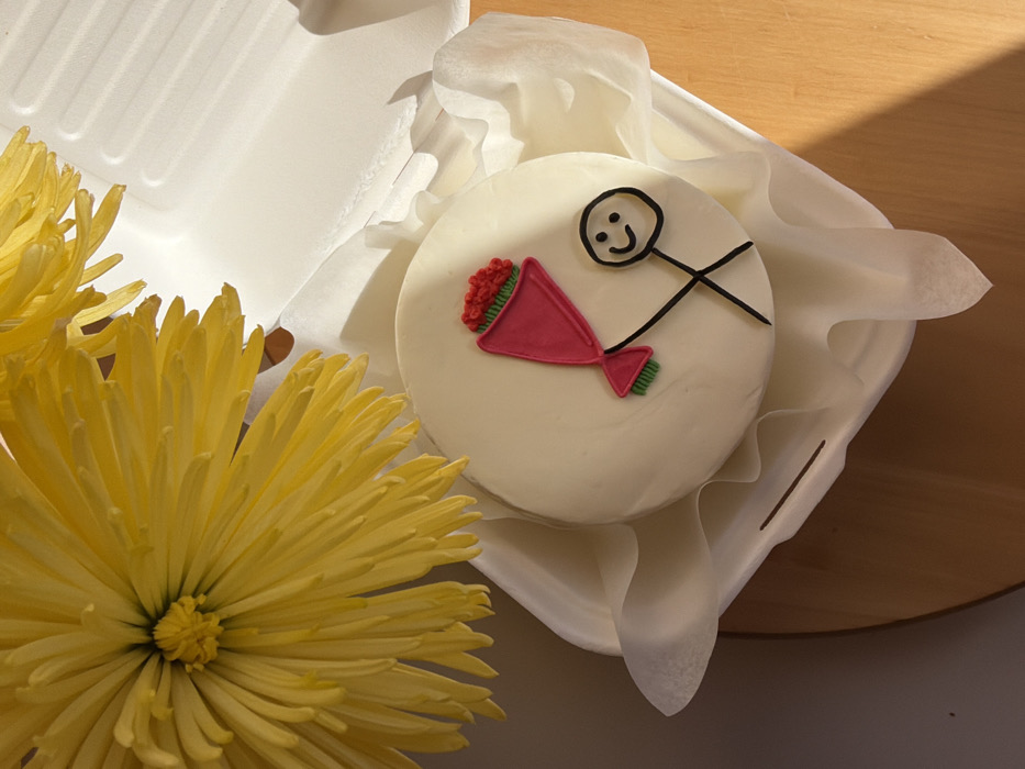 International Women's Day cake spotted in Tel Aviv takeout container