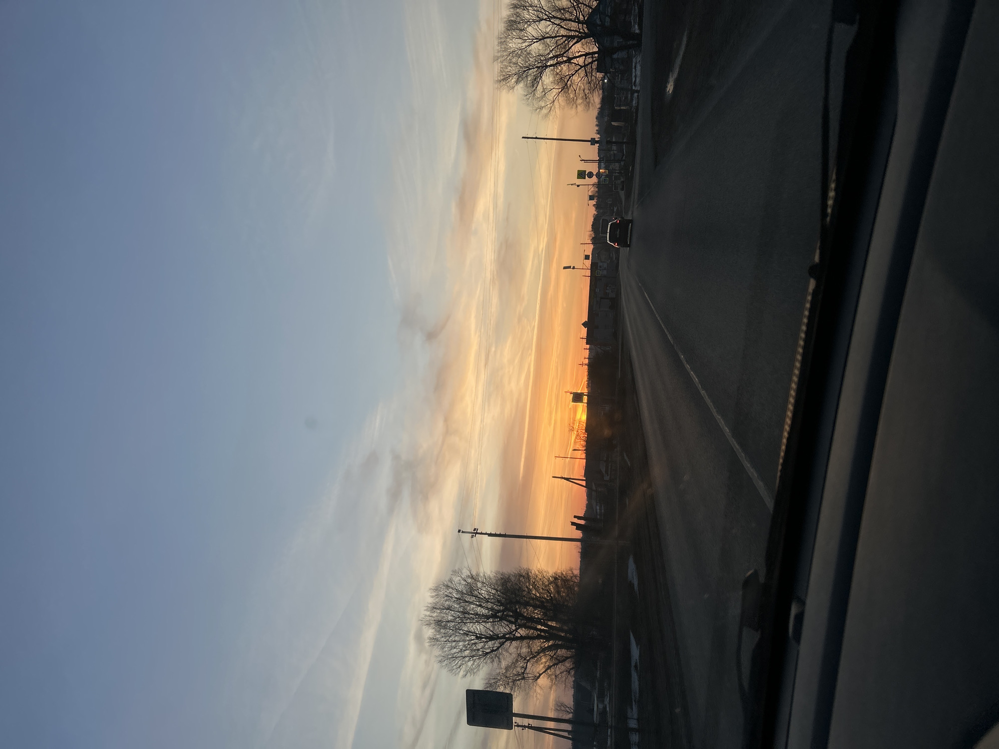 Sunset captured from street and vehicle in Гаревая, Russia