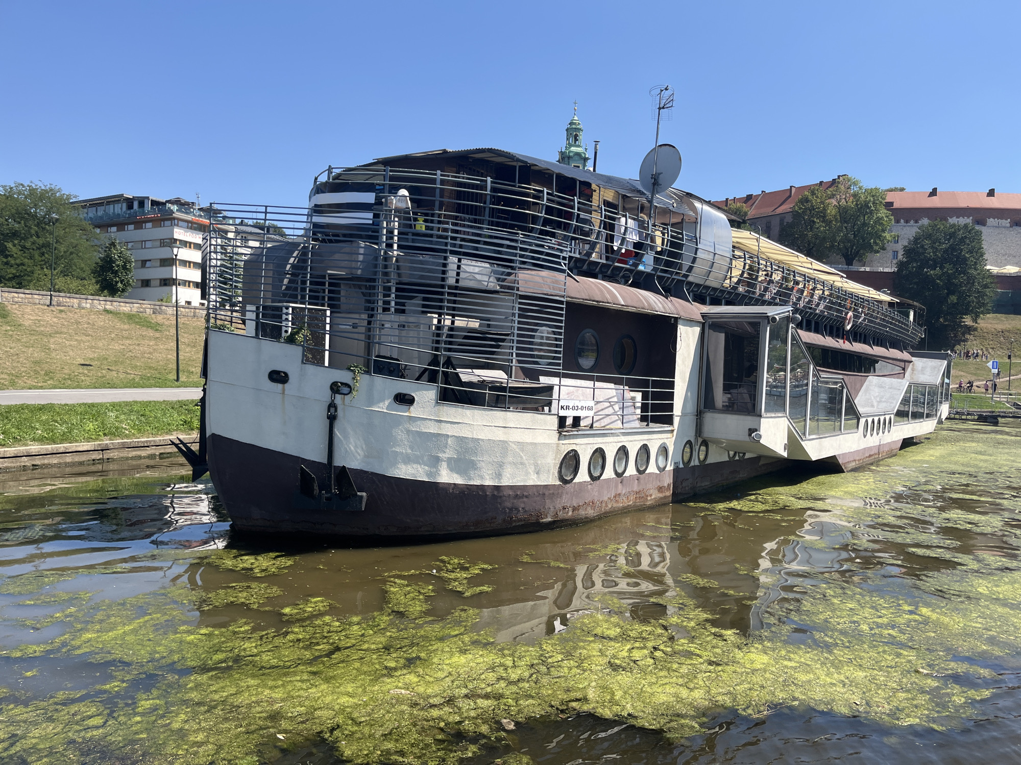 Krakow's Vistula riverfront and Wawel Castle on a summer morning