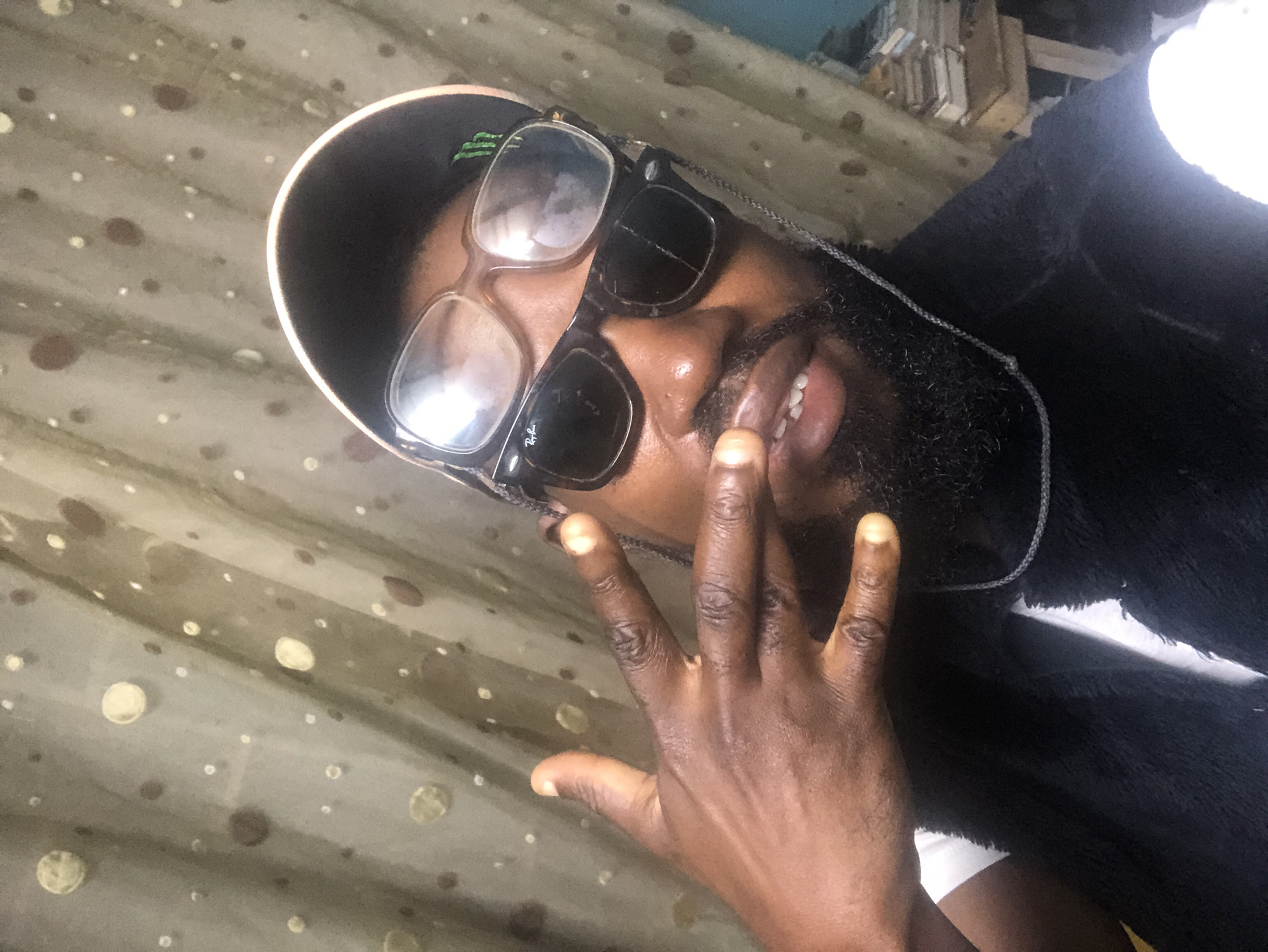 Selfies and a dead cockroach on a Lagos morning