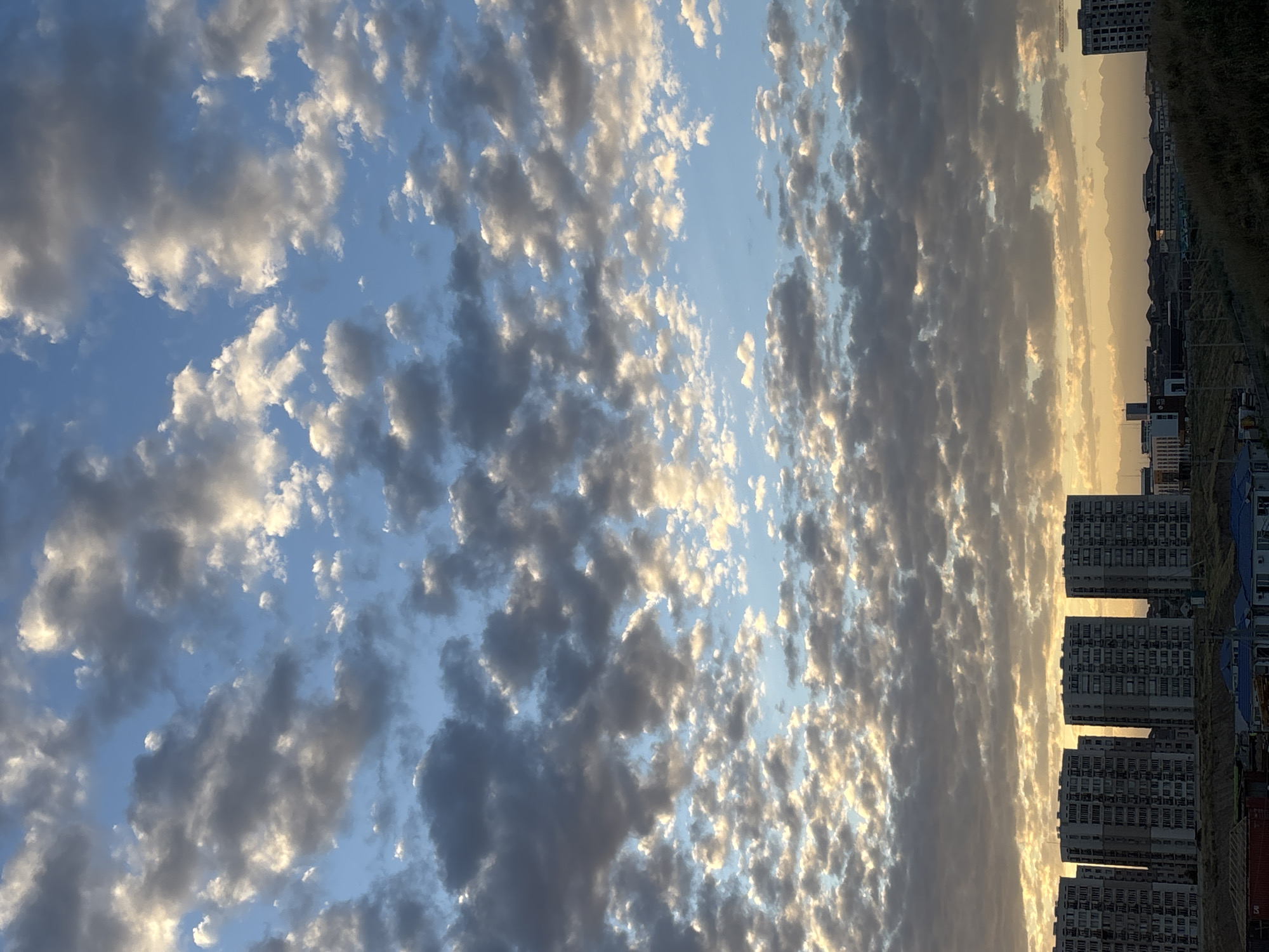 Cloudy skyline view over Shymkent from elevated ground